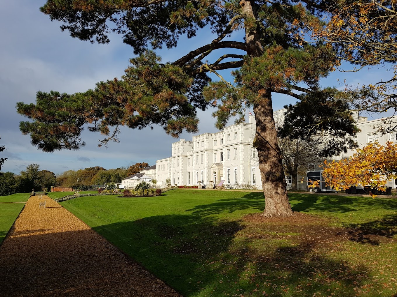 Wokefield Suite venue, elegant white building, ideal for corporate events and gatherings.