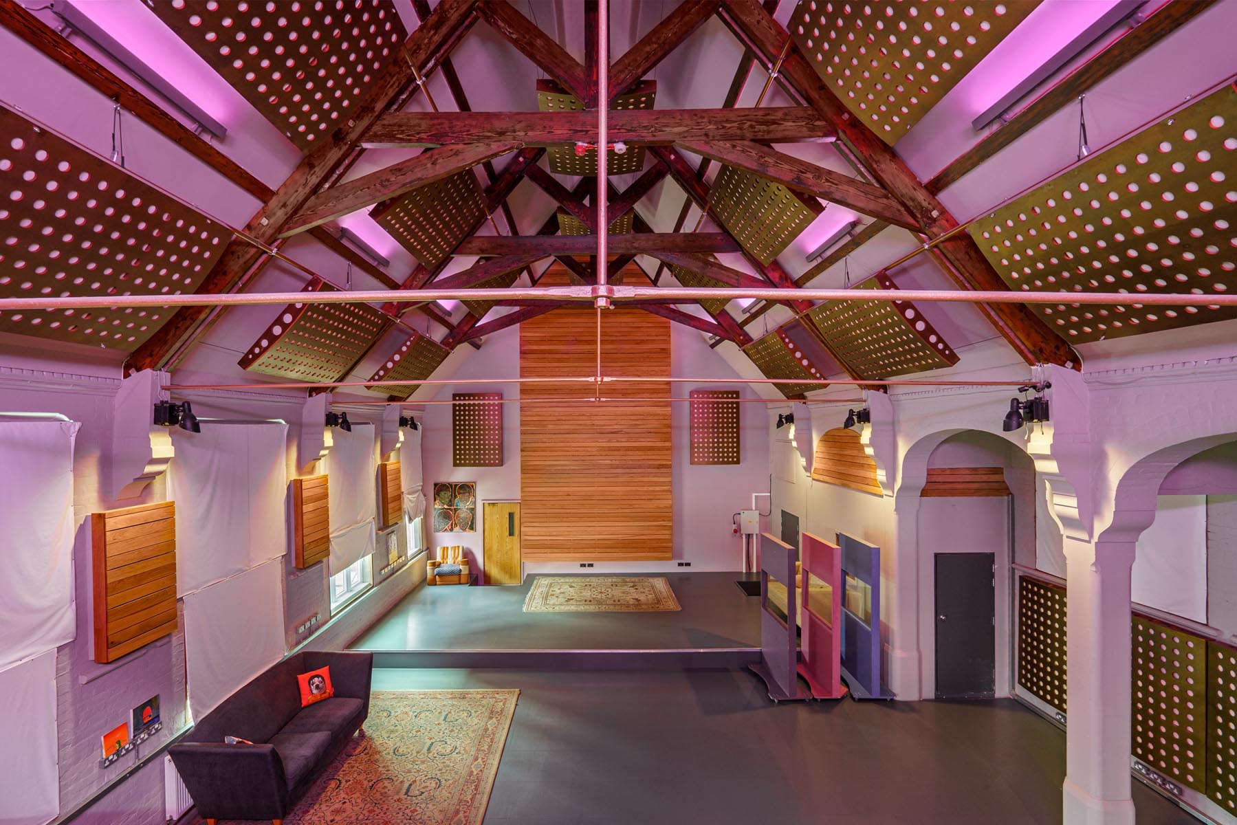 Versatile event space with exposed beam ceiling at The Empire Broadcasting Corporation.