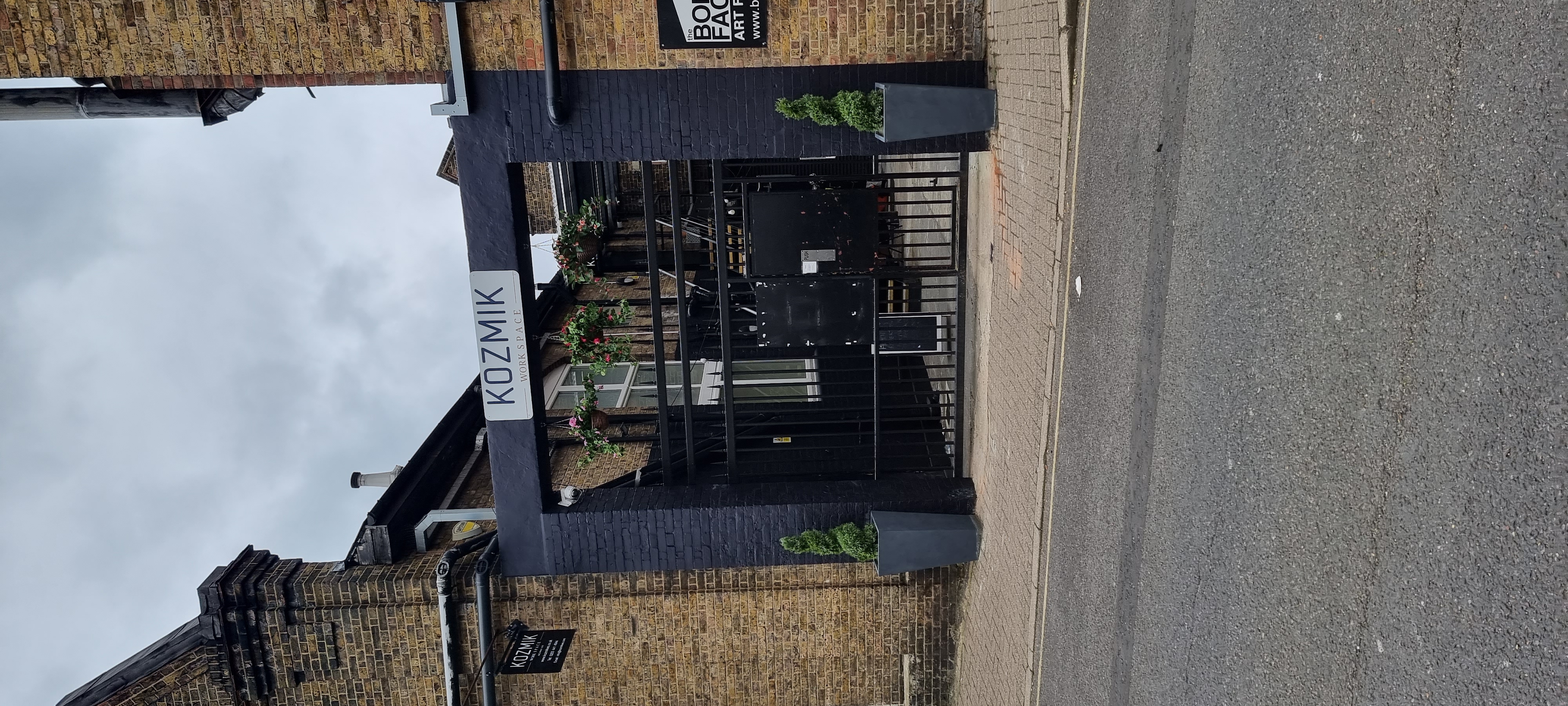 Hot Desk entrance at KOZMIK WORK SPACE, ideal for creative events with industrial charm.