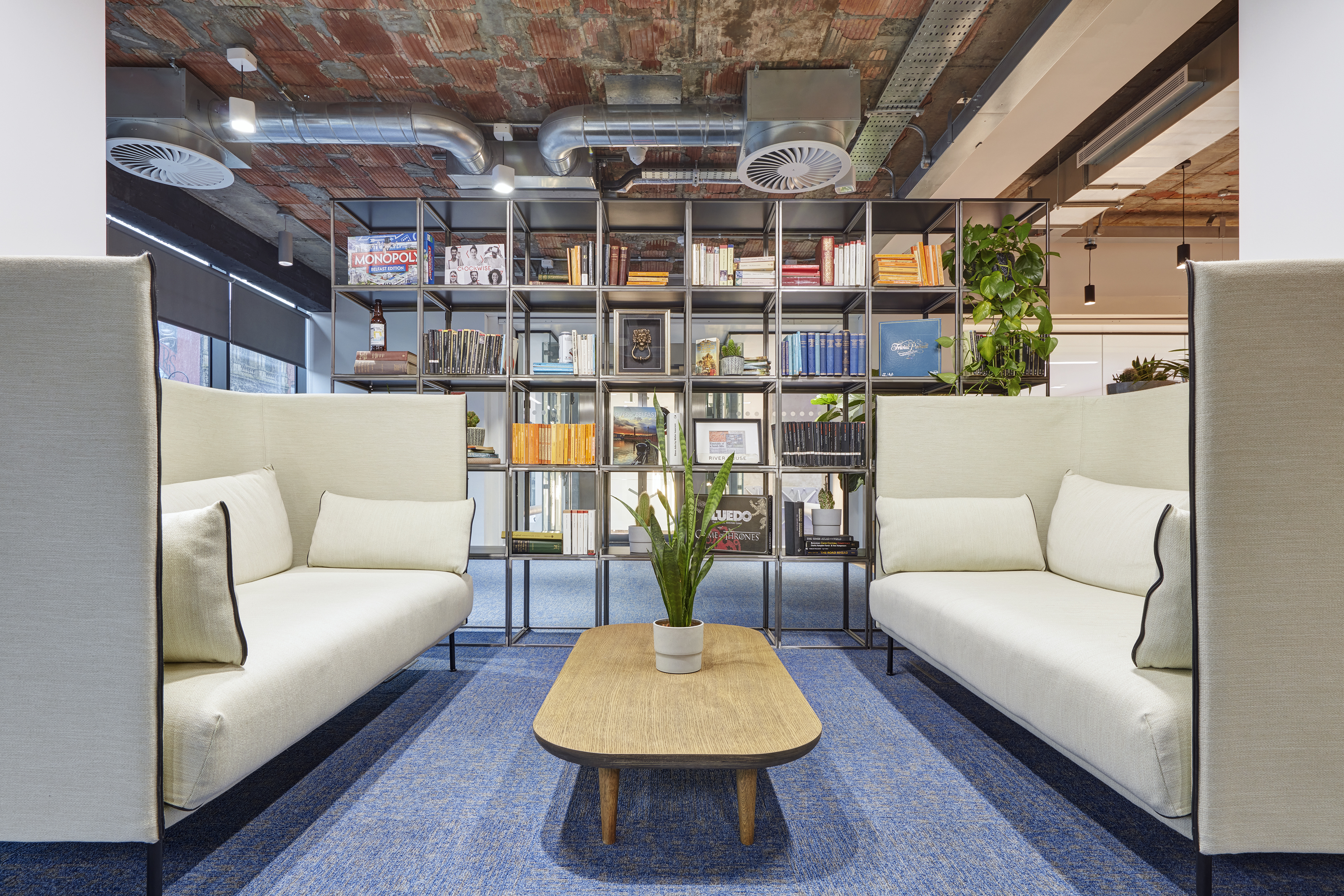 Modern meeting space with cozy seating for creative brainstorming sessions.