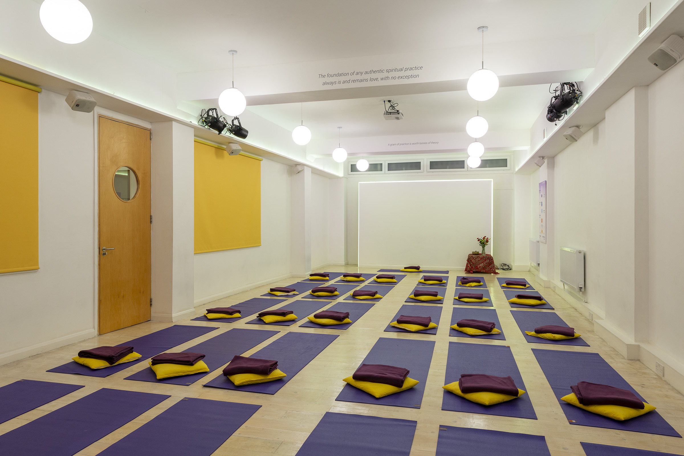 Hridaya Studio at Tara Yoga Centre: versatile wellness event space with yoga mats.