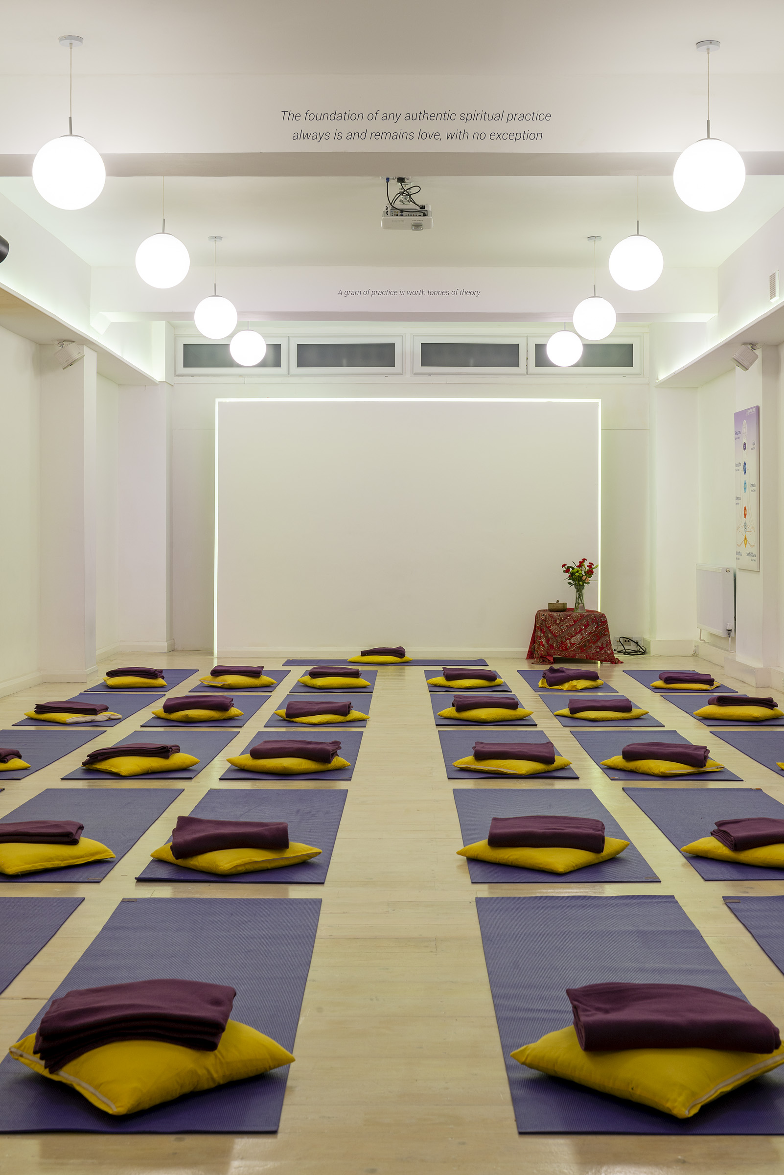 Serene Hridaya Studio with yoga mats, ideal for wellness workshops and retreats.