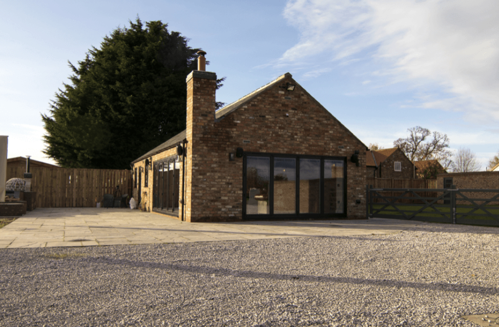 Lola The Victorian Summerhouse: modern brick event space for meetings and workshops.