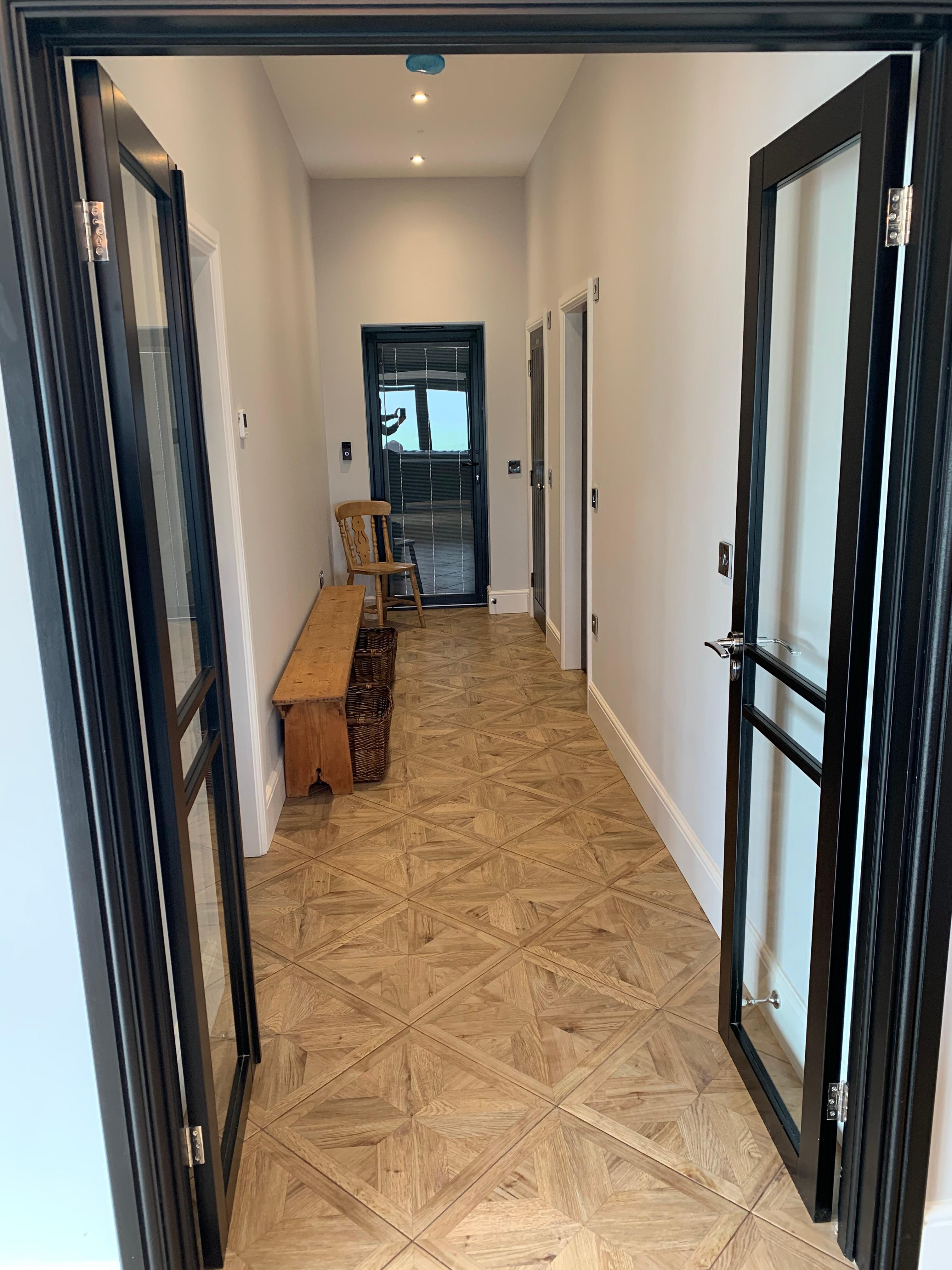 Lola The Victorian Summerhouse corridor with wooden flooring for events and networking.