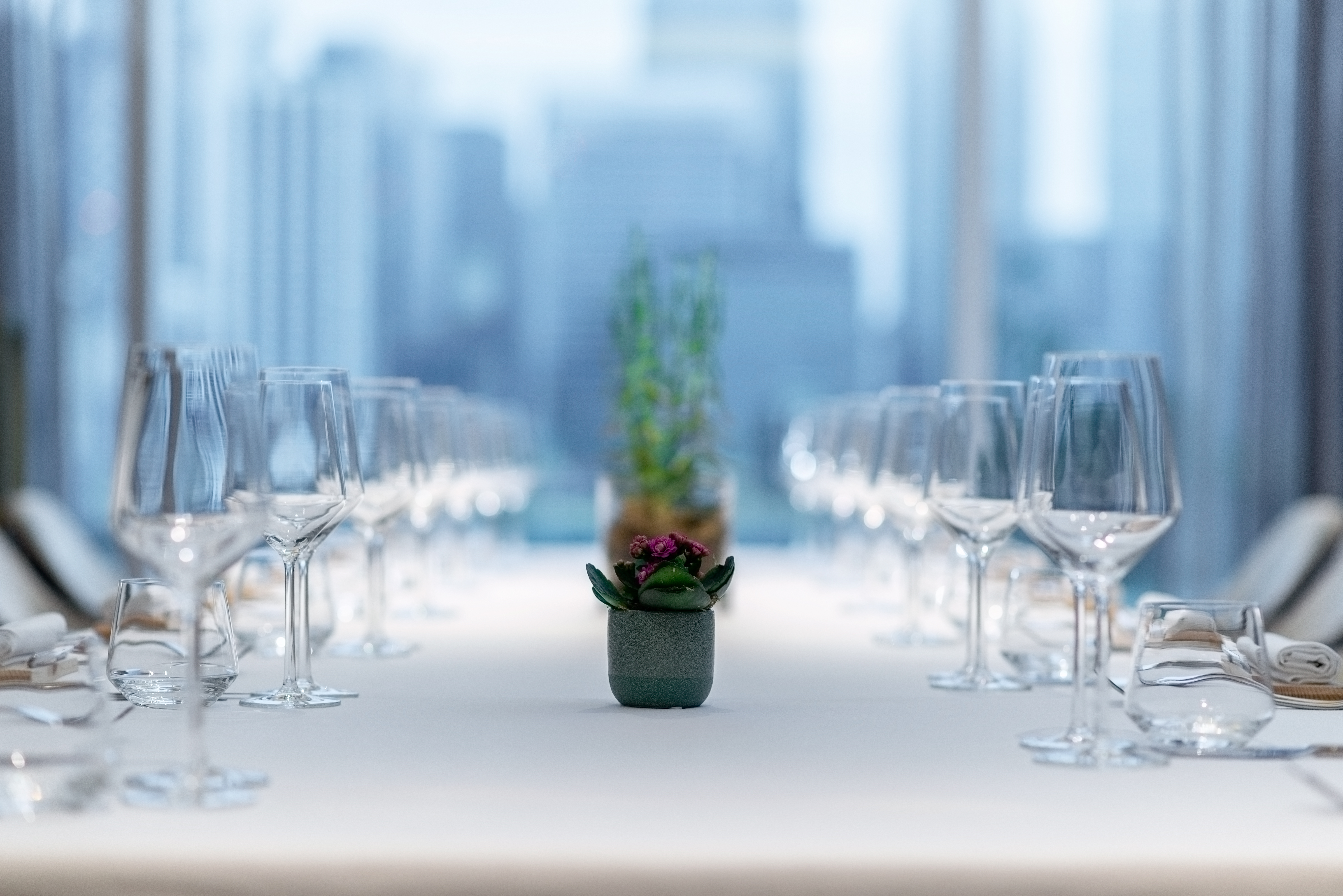 Elegant dining table setup at Peninsula Private Dining, ideal for corporate events.