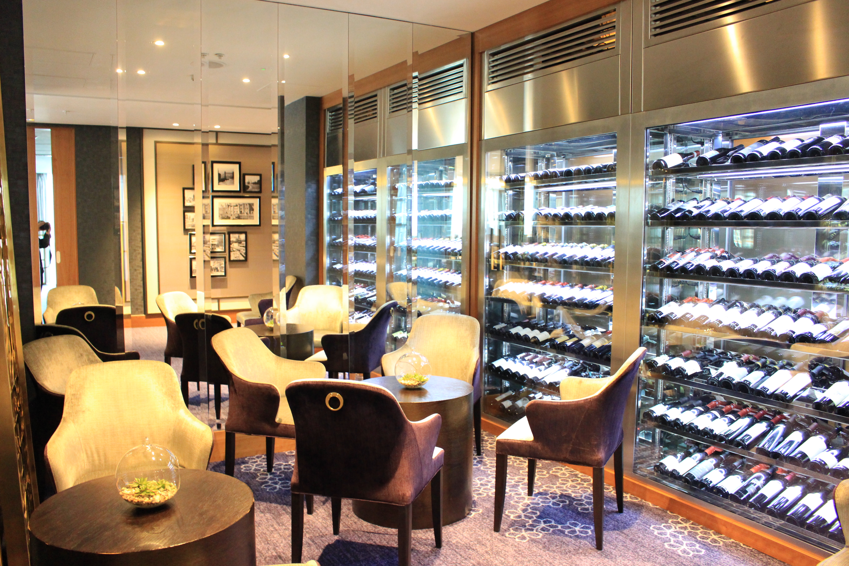 Elegant wine lounge at Peninsula Private Dining, ideal for intimate meetings and tastings.