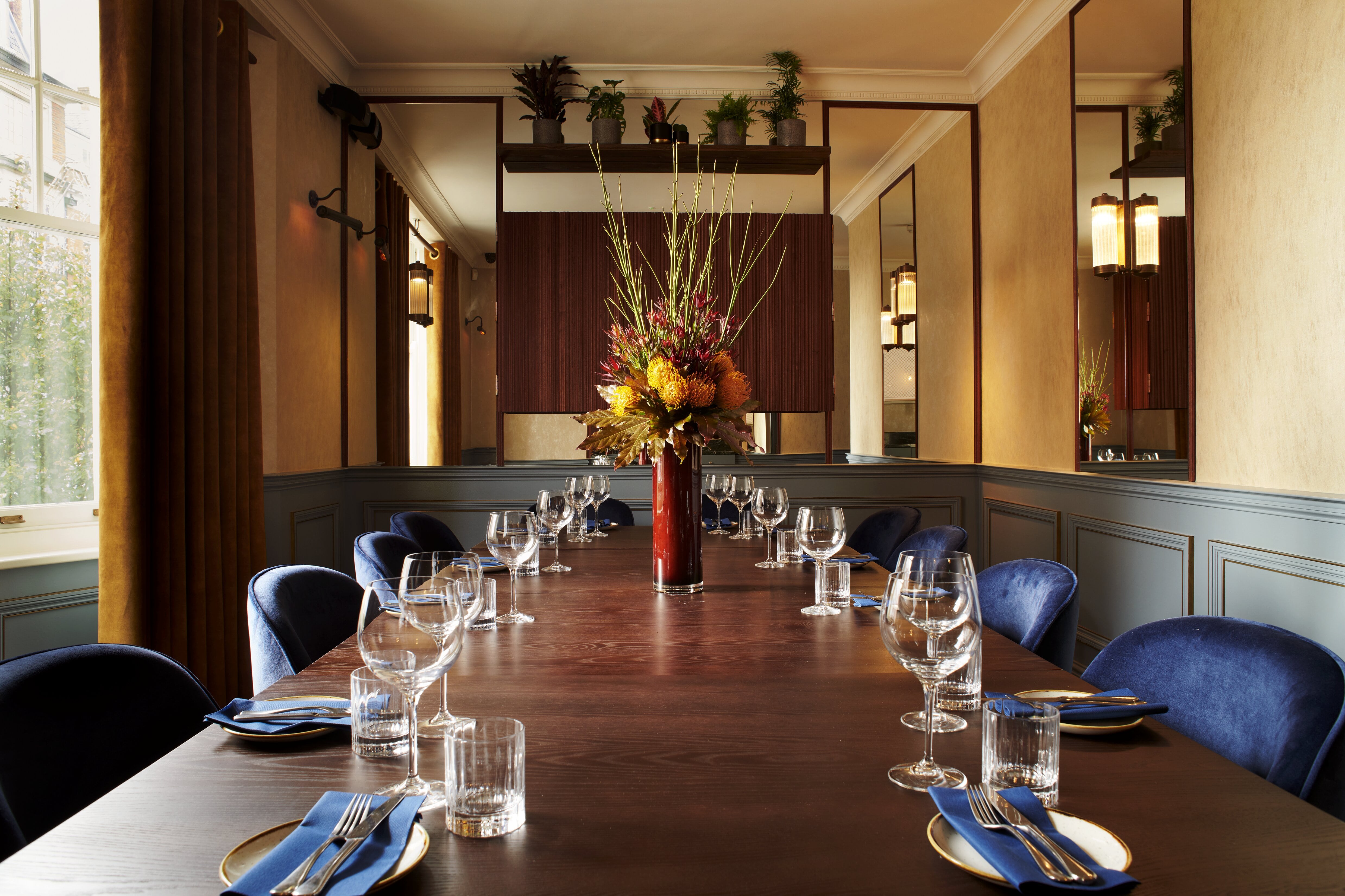 Private dining room with elegant table setting for upscale events and meetings.