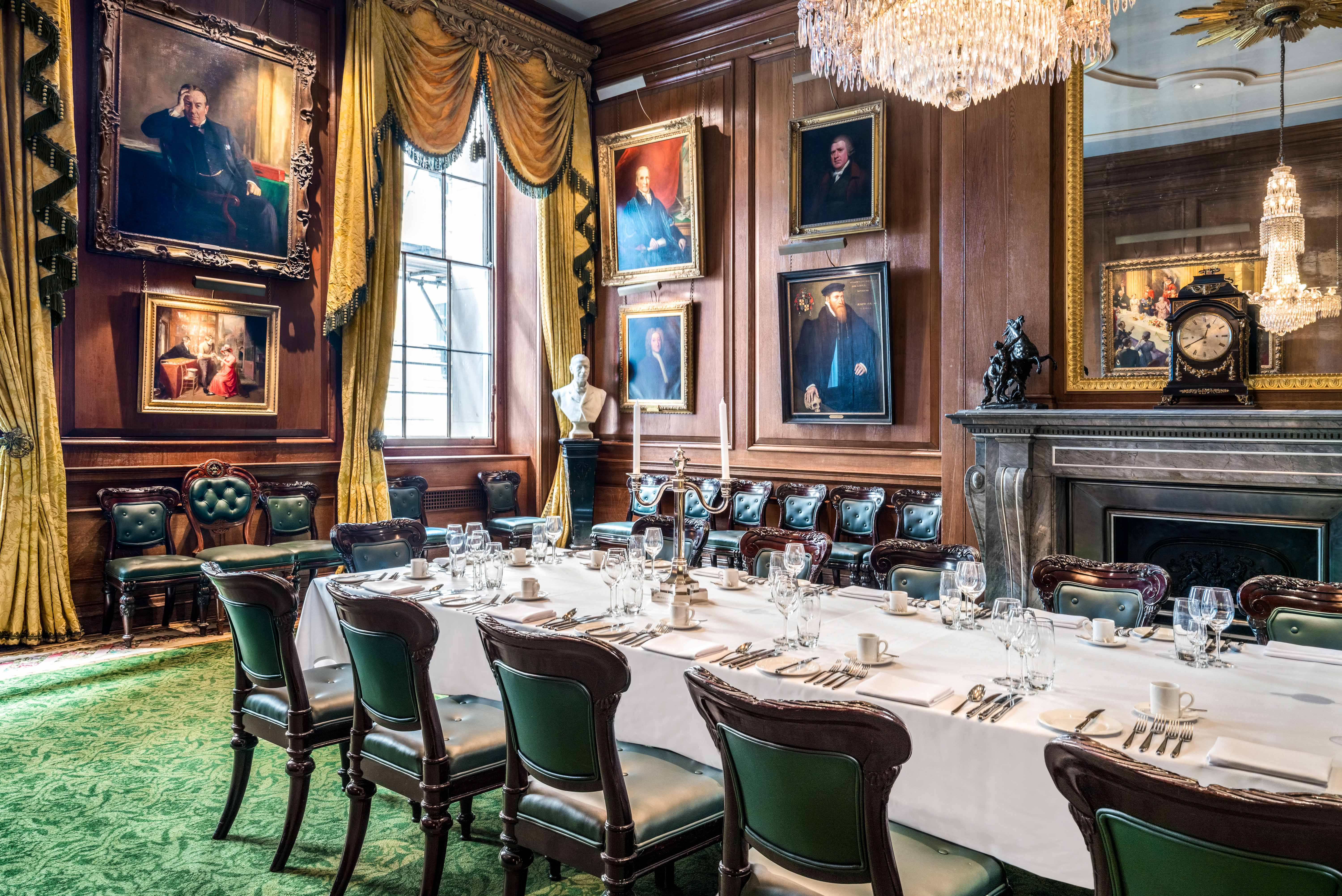 Elegant Luncheon Room at Goldsmiths' Hall, featuring a long dining table for formal events.