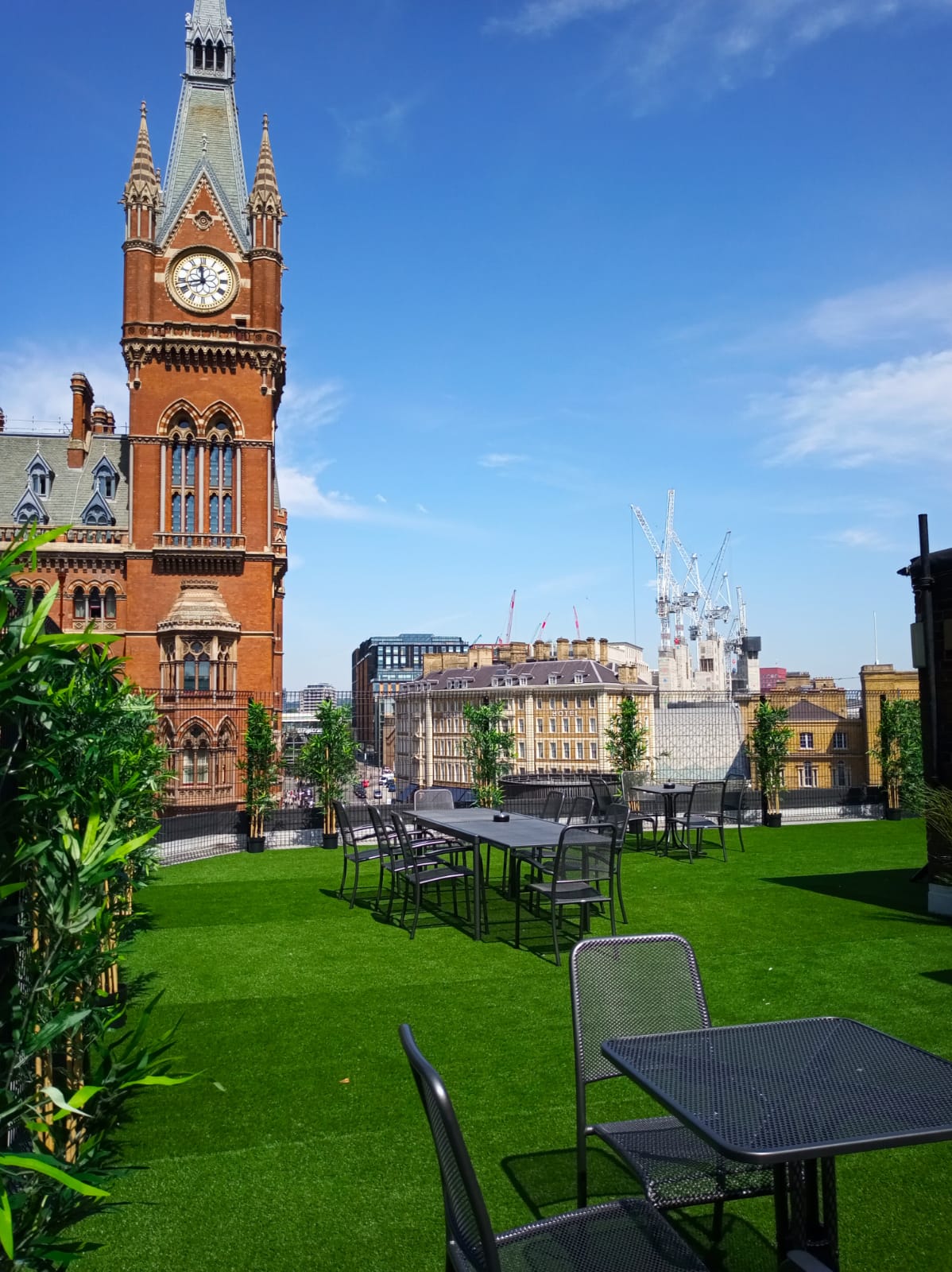 Tom Dixon Boardroom rooftop venue with greenery, ideal for outdoor events and networking.