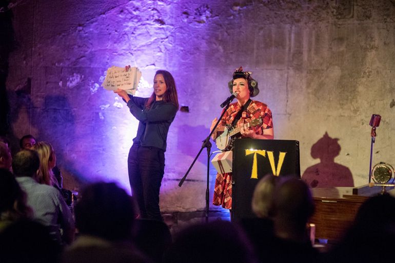 Tunnel Shaft performance with vibrant lighting at The Brunel Museum event.