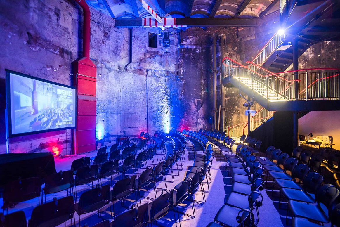 Tunnel Shaft event space with exposed brick walls, ideal for presentations and workshops.