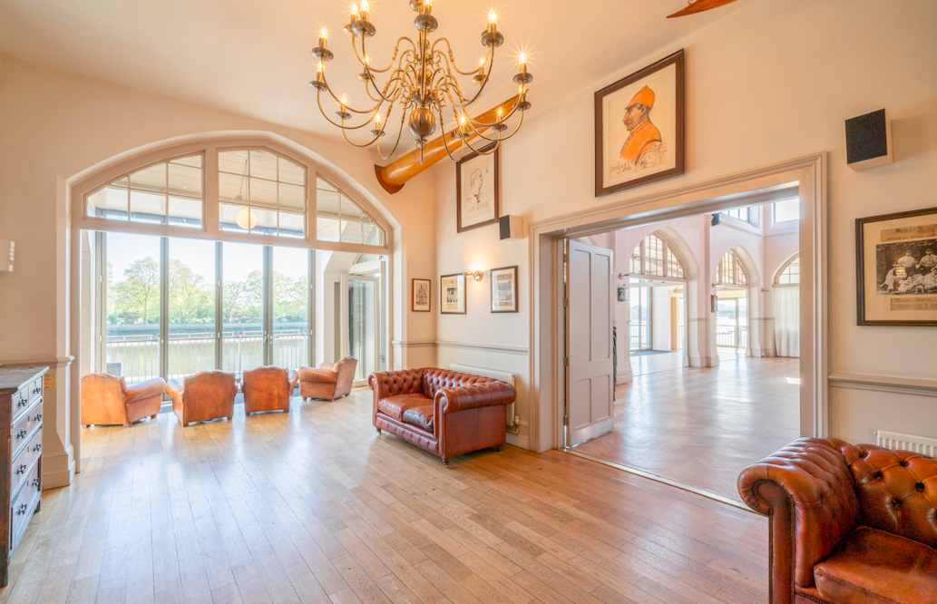 Great Hall at Thames Rowing Club with large windows, ideal for events and gatherings.