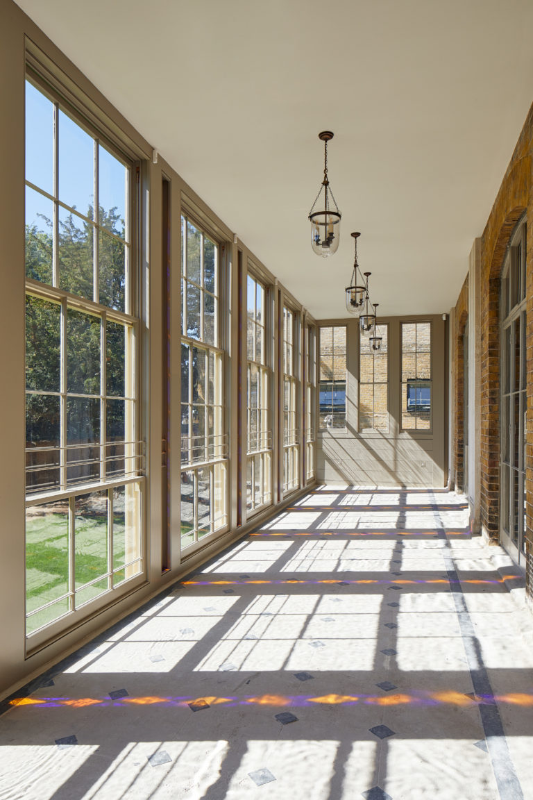 Soane Suite corridor with large windows, ideal for networking events at Pitzhanger Manor.