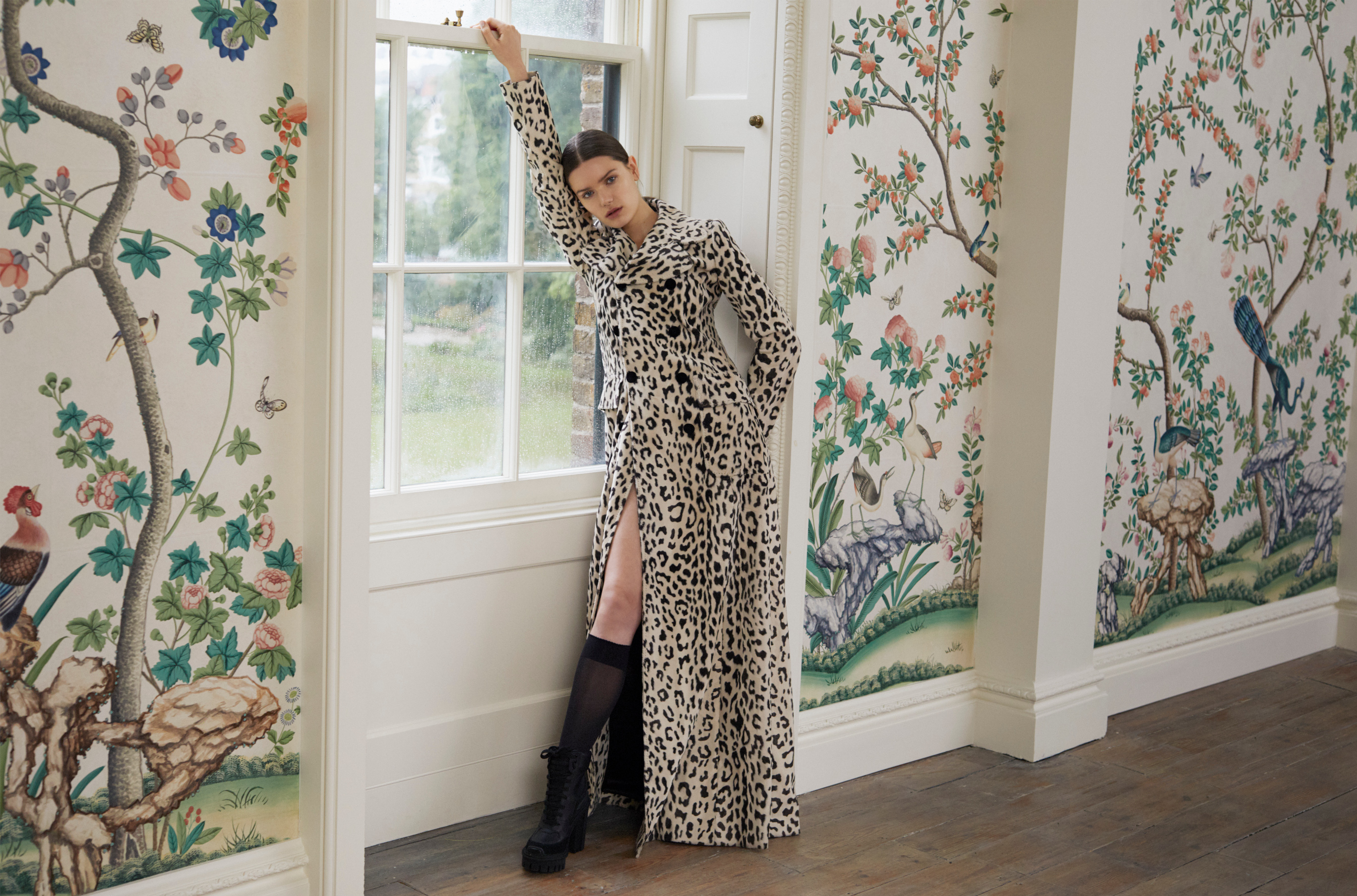 Stylish individual in elegant Upper Drawing Room, ideal for fashion shows and gatherings.