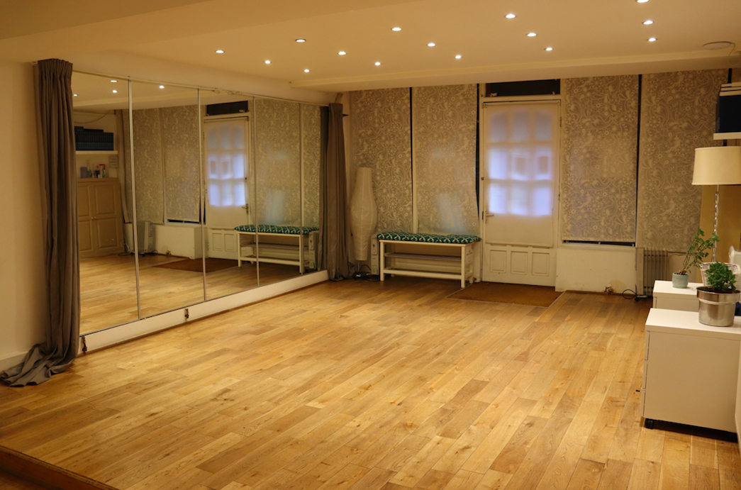 Versatile event space with natural light, ideal for workshops and fitness classes.