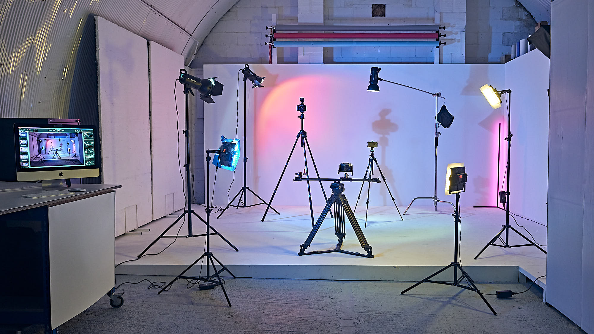 "Arch Photo Studio setup with lights for virtual events and professional photo shoots."