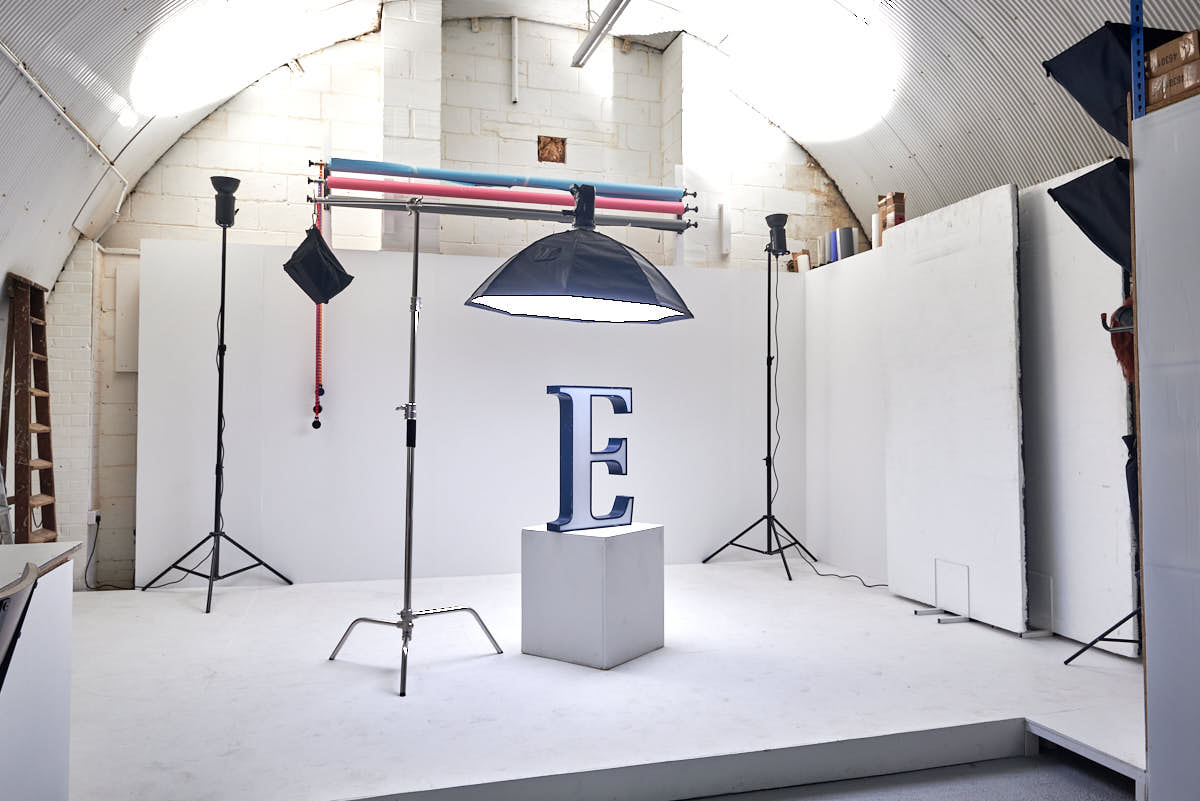Minimalist Arch Photo Studio with large "E" for product launch and branding events.