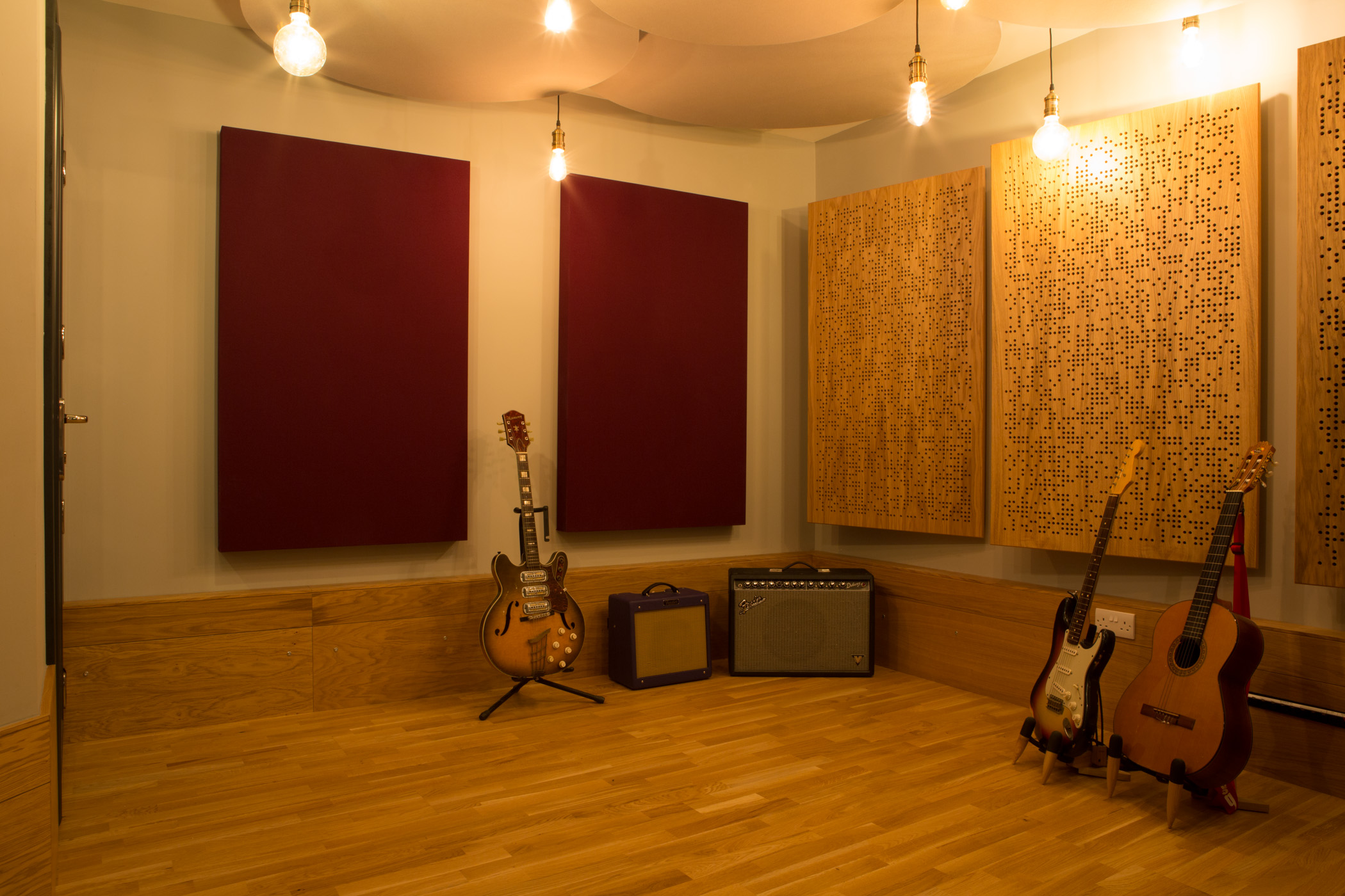 Intimate Dock Street Studio with acoustic panels for music events and creative workshops.