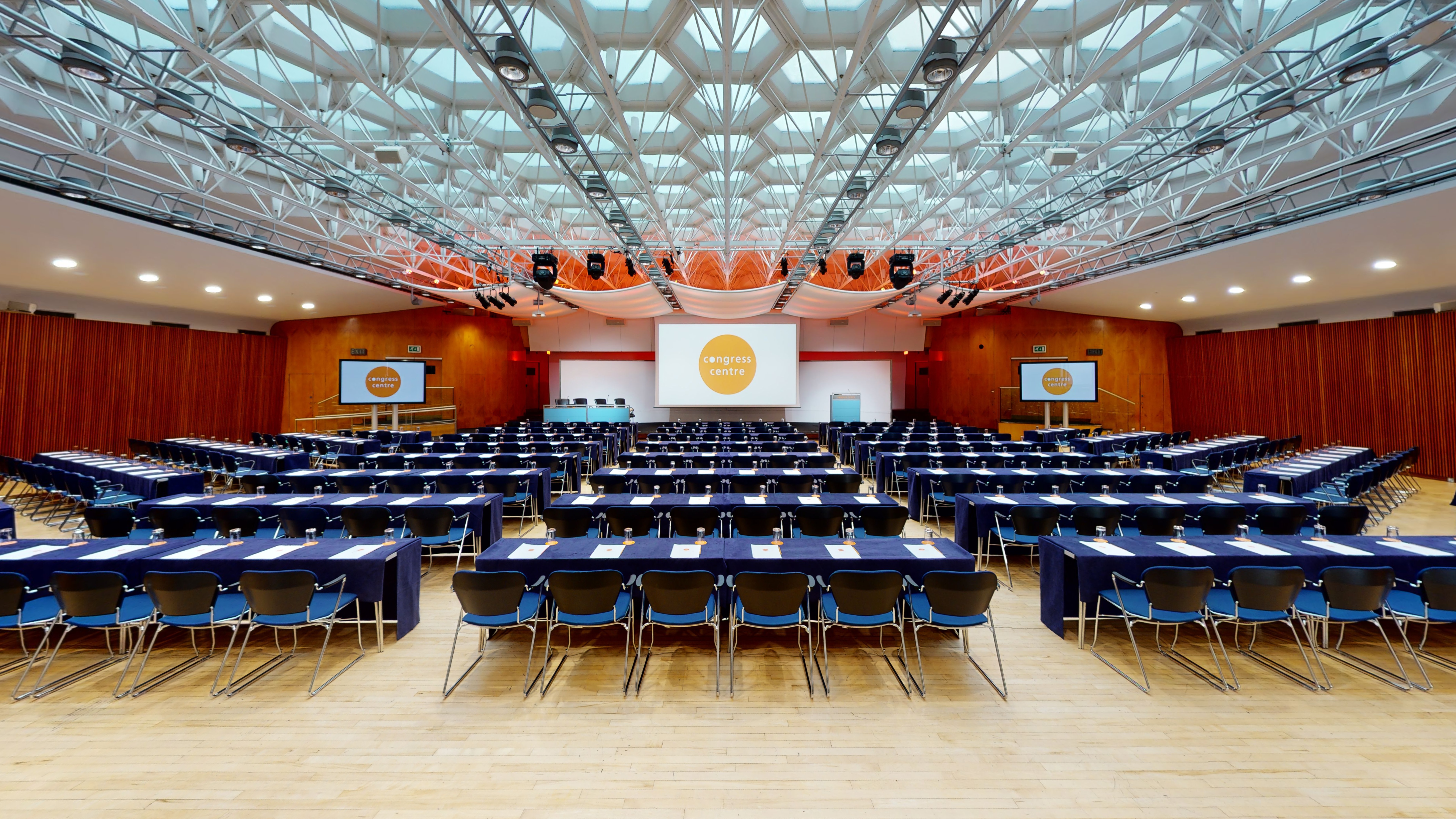 Congress Hall ballroom in classroom setup with architectural ceiling for conferences and meetings.