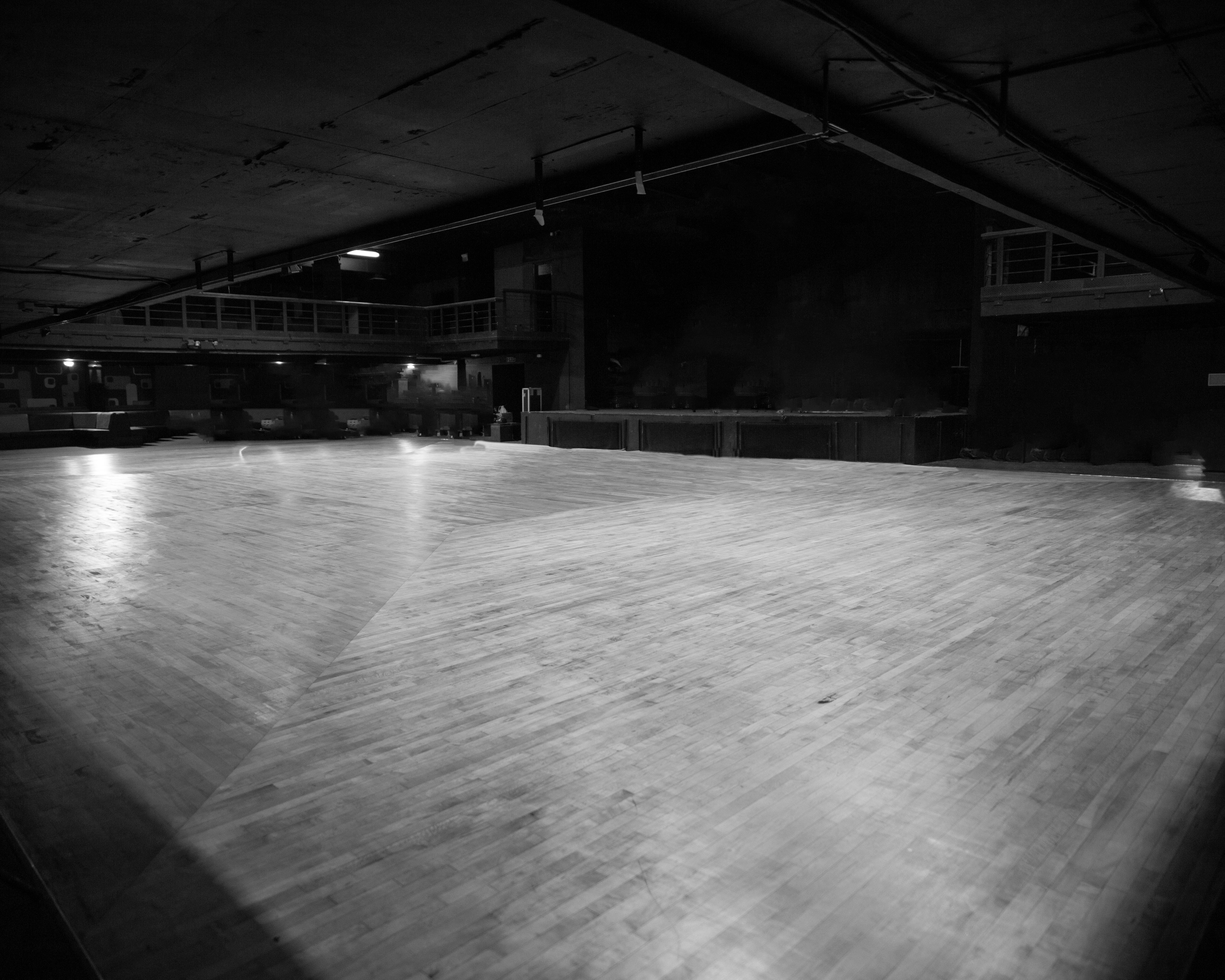 Spacious empty event venue with polished wooden floor in Forum HQ Birmingham.