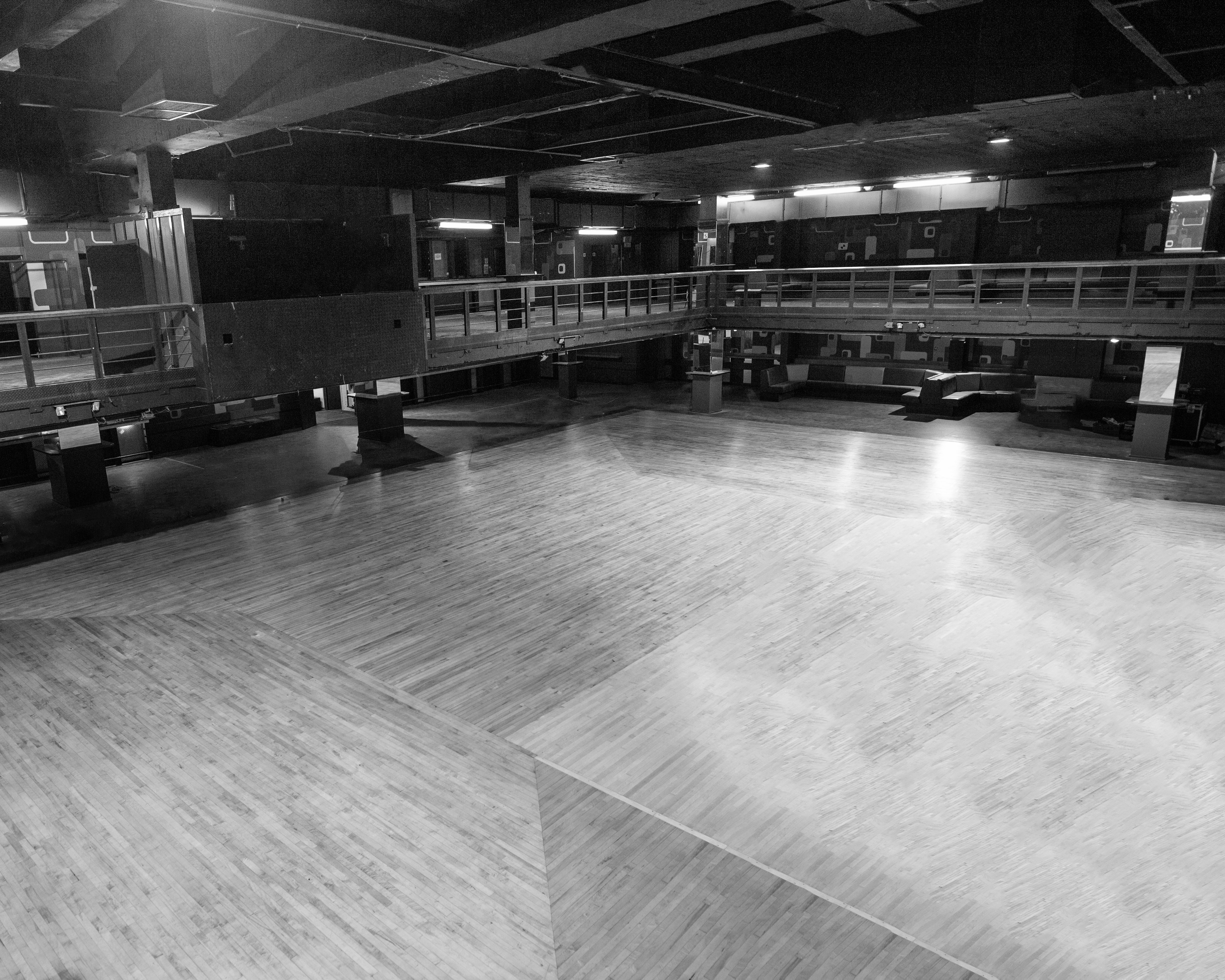 Spacious event venue with polished wooden floors in Forum HQ Birmingham for exhibitions and performances.