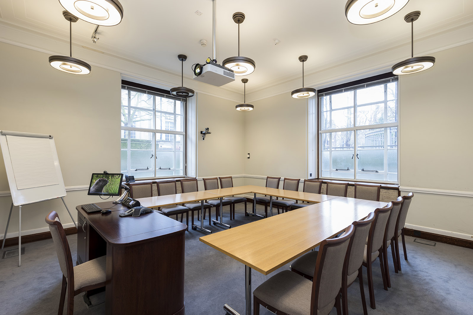 Meeting room at University of London, featuring a large table for professional events.