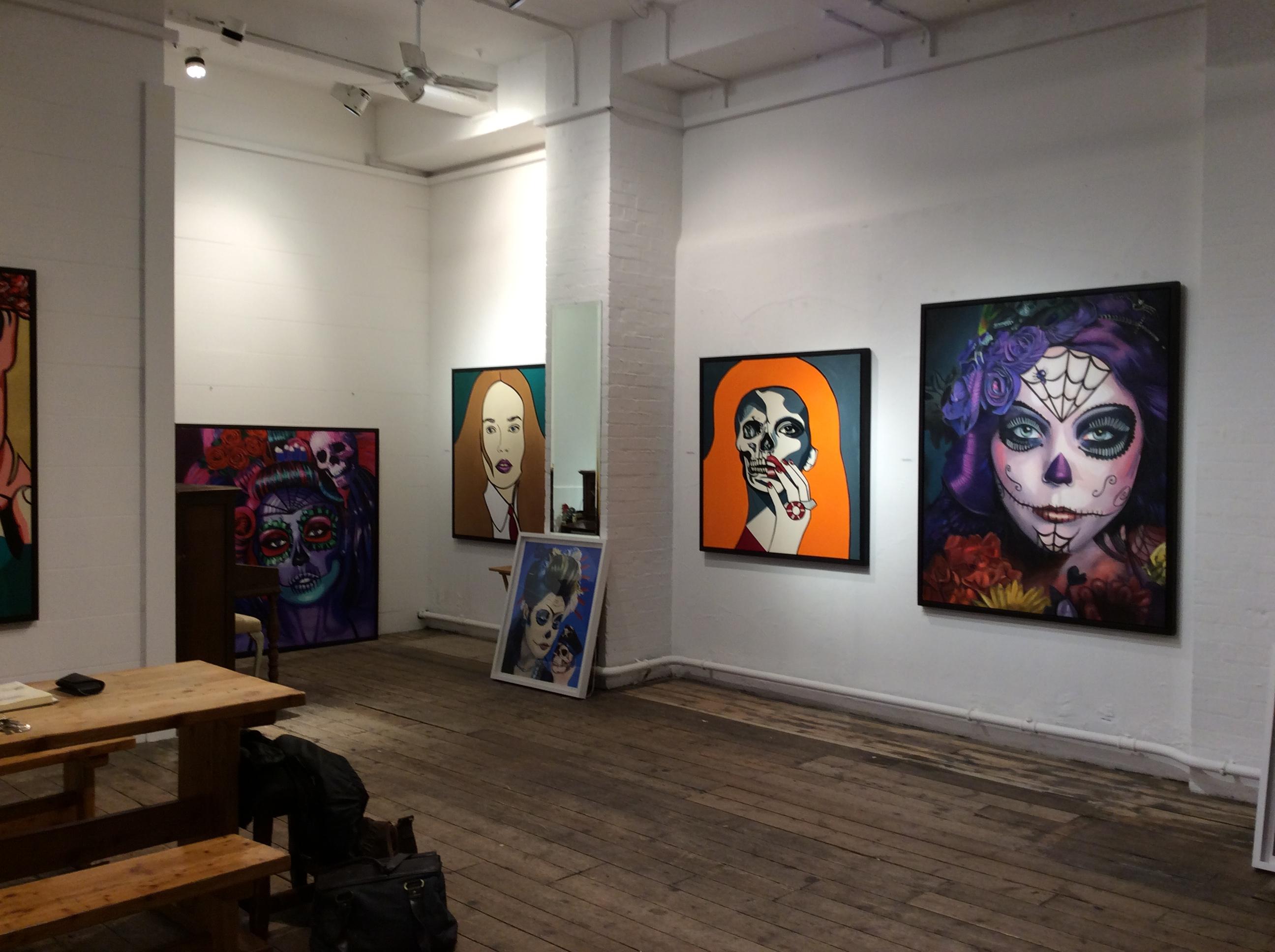 Vibrant art gallery venue with colorful artwork for creative events and meetings.