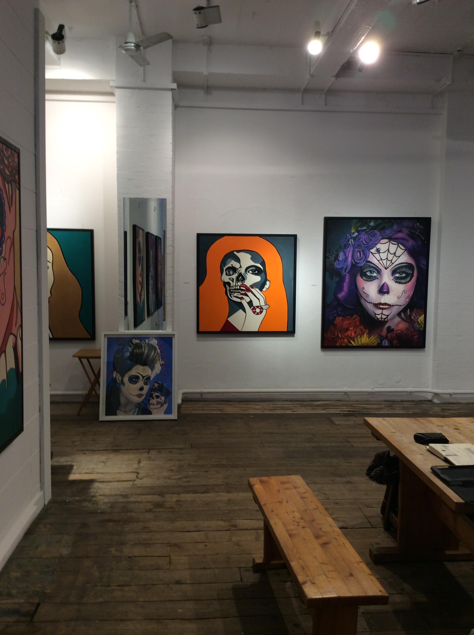 Vibrant art gallery venue with colorful artwork for creative events and gatherings.
