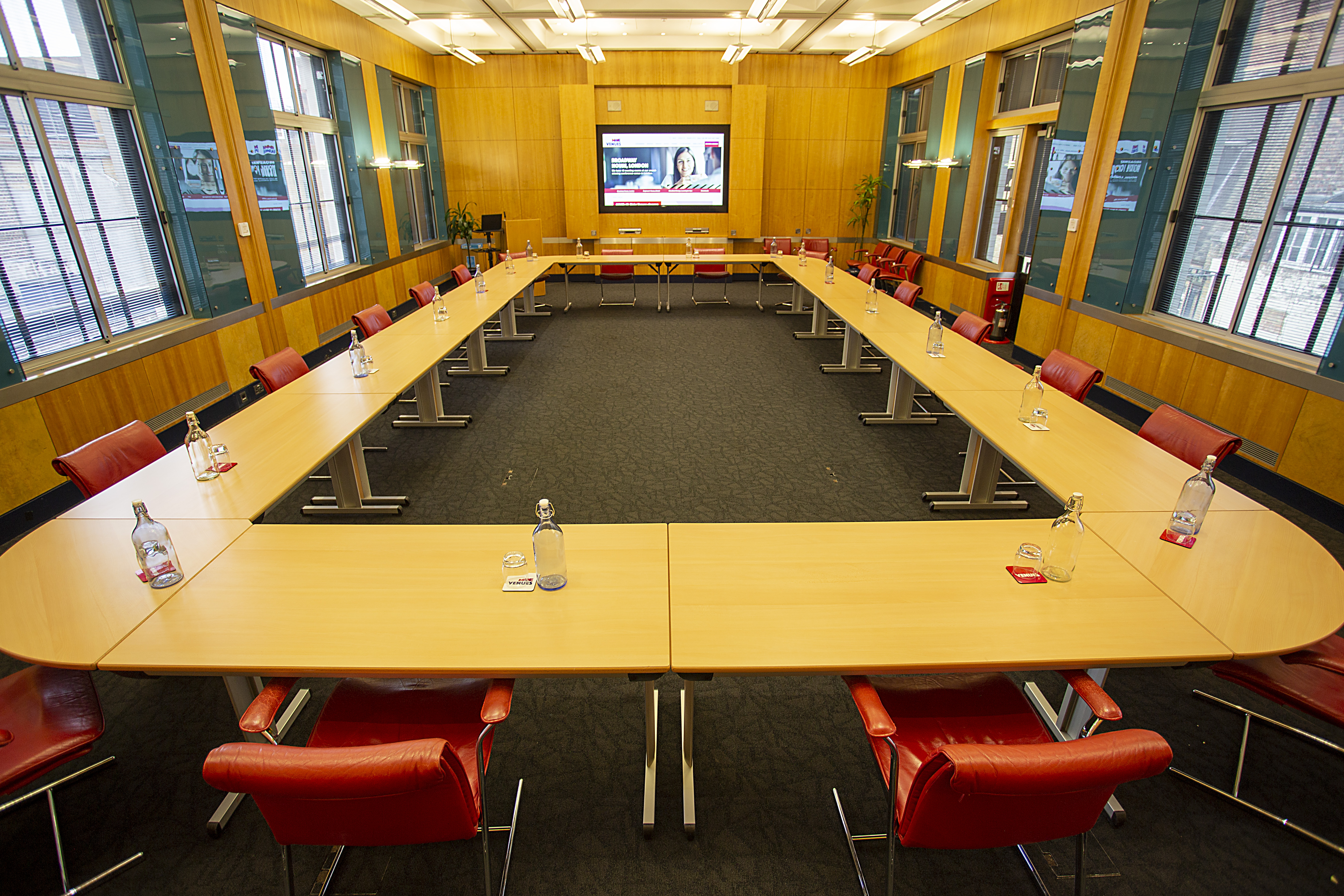 Modern U-shaped conference room in Broadway House, ideal for meetings and presentations.