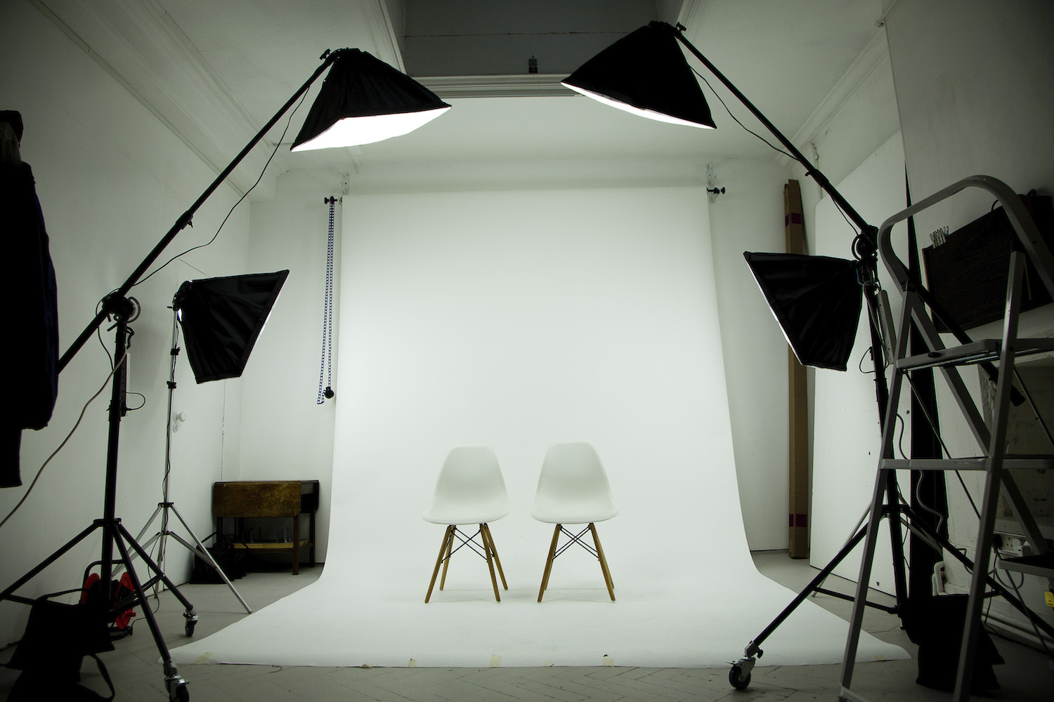Minimalist photography studio in Butler with white backdrop, ideal for professional shoots.