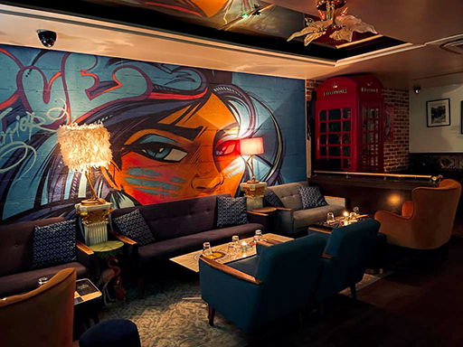 Geisha Lounge in Callooh Callay Chelsea, vibrant mural, ideal for cocktail receptions.