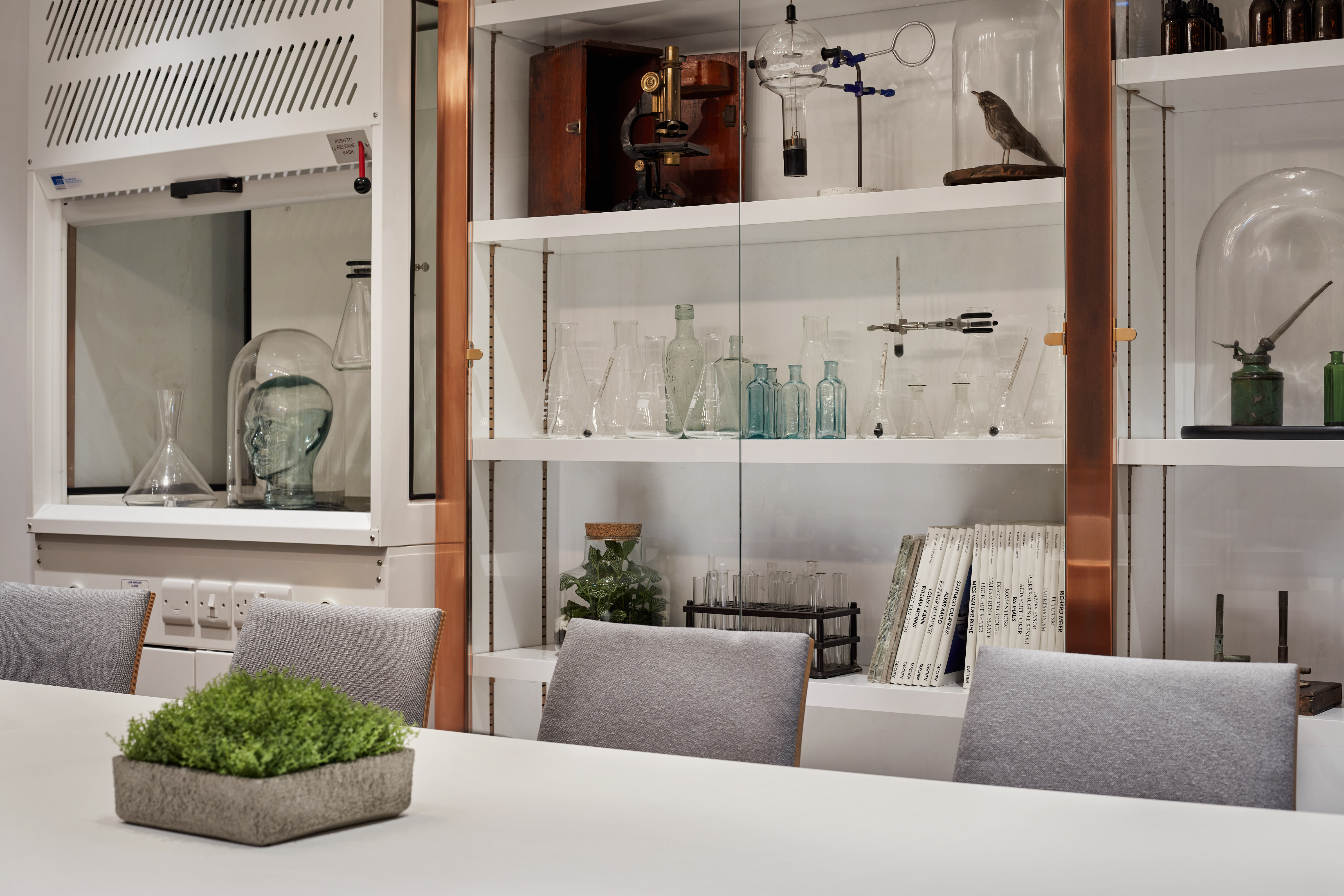 Modern meeting space at Holmes Hotel London with glassware, ideal for workshops and brainstorming.