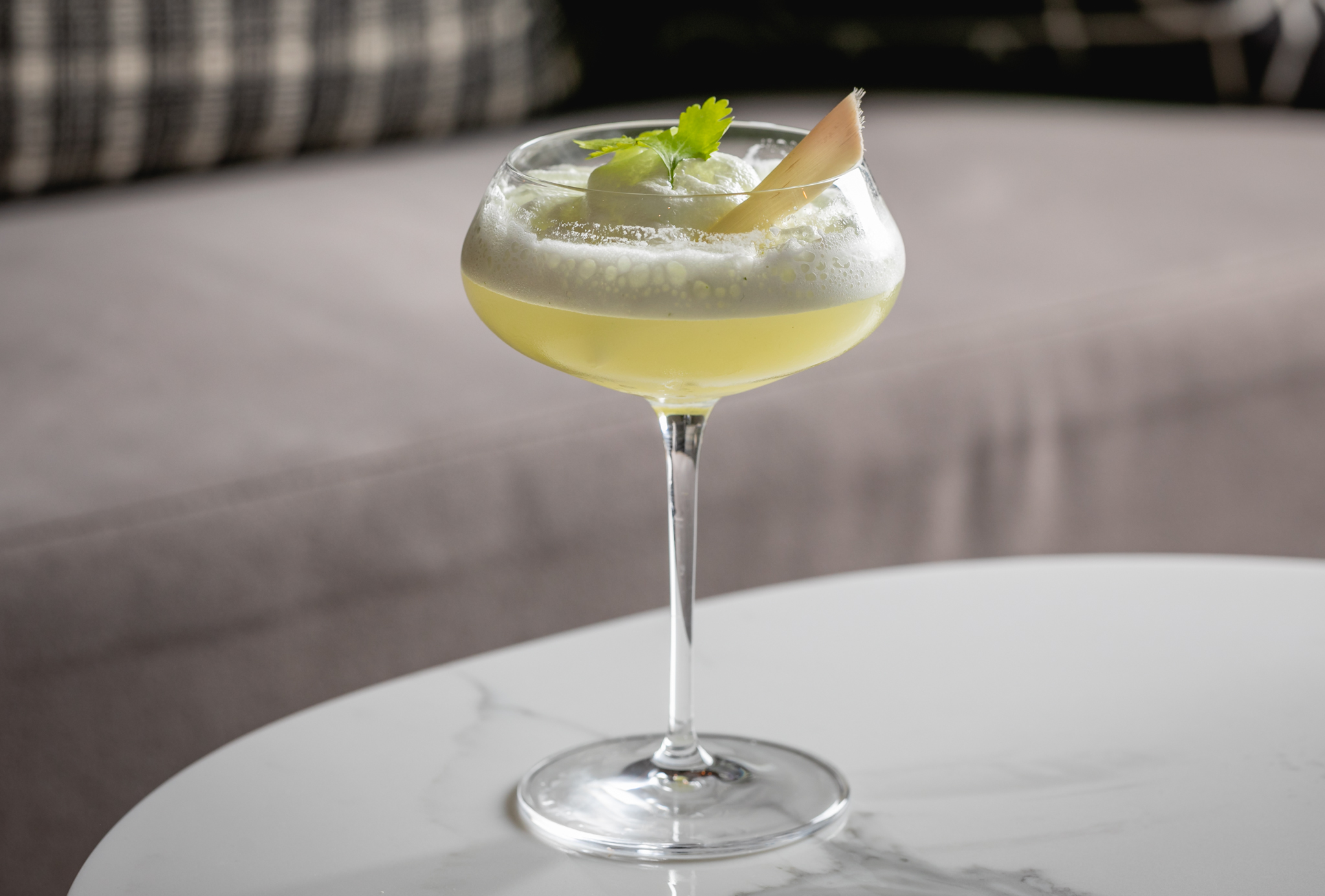 Elegant cocktail in glassware at The Laboratory, Holmes Hotel London - event beverage idea.