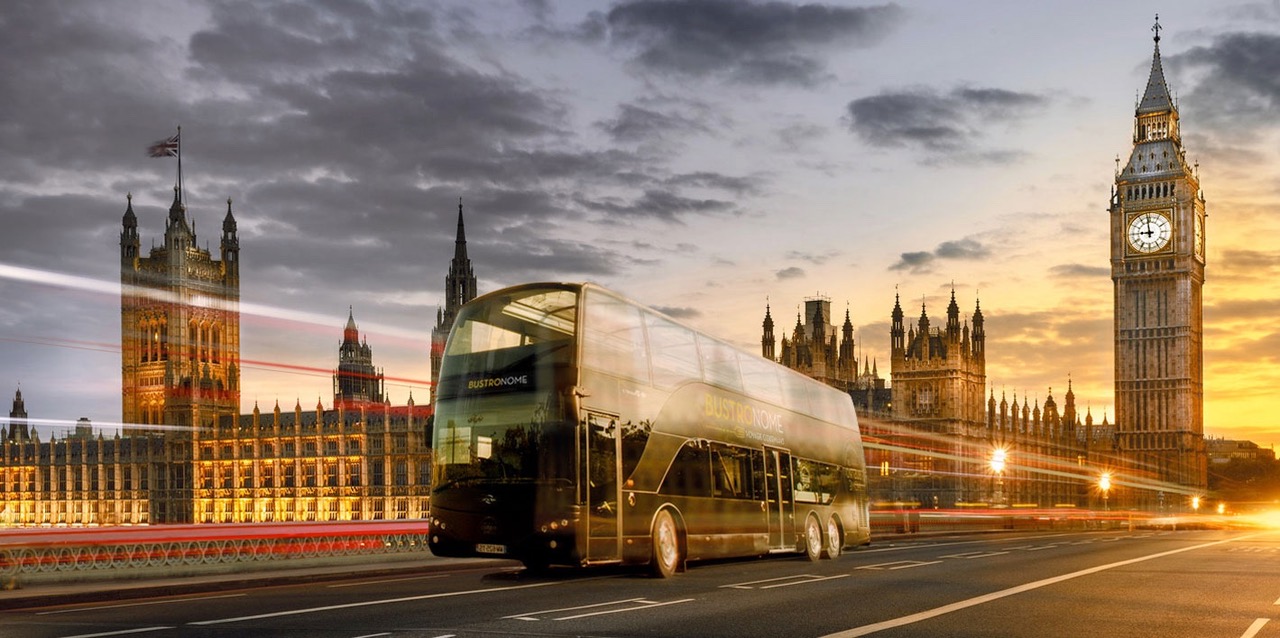 Double-decker bus near Big Ben, ideal for London city tours and event transfers.