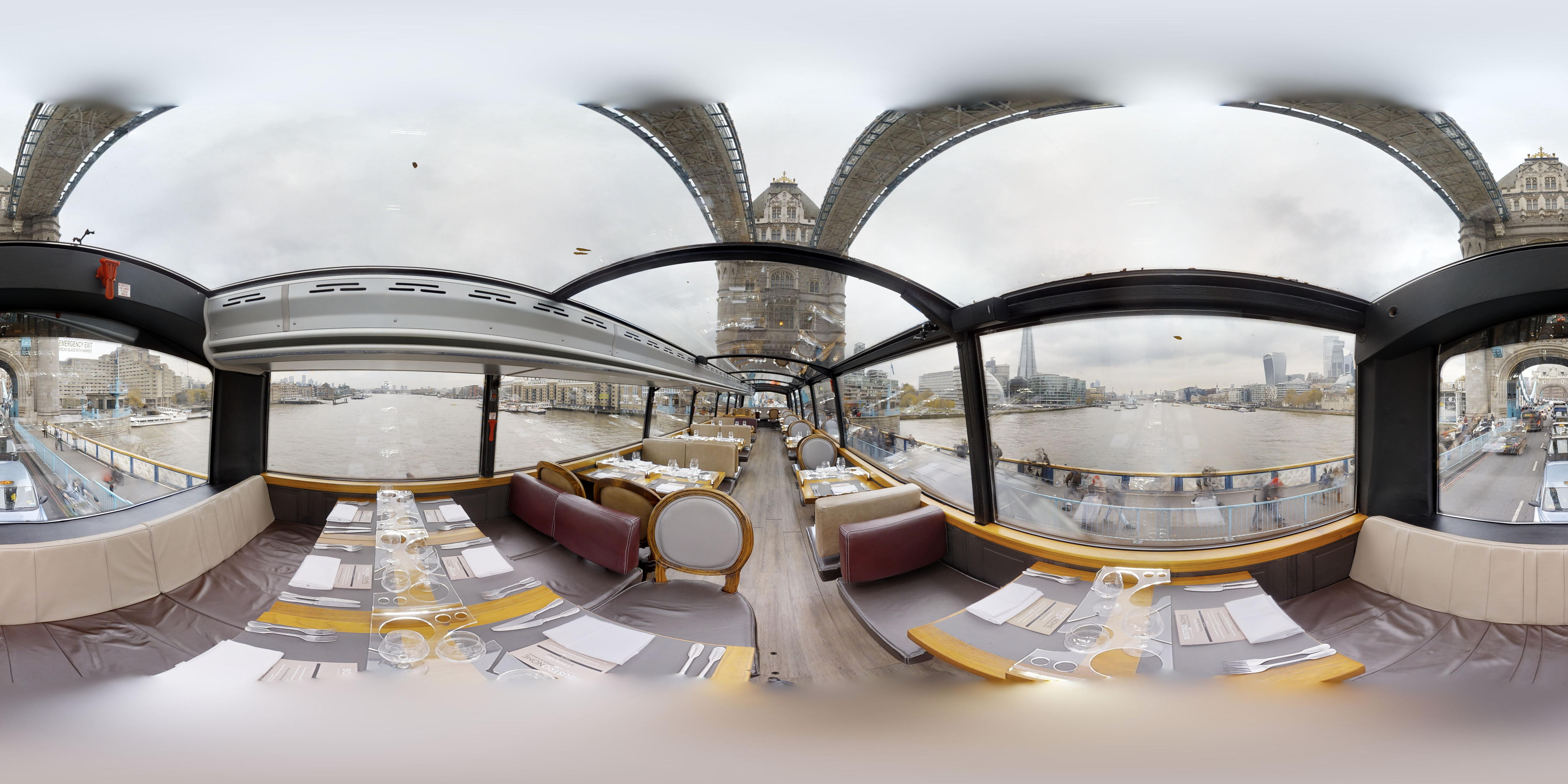 Upscale riverboat dining venue with panoramic views for corporate events and celebrations.