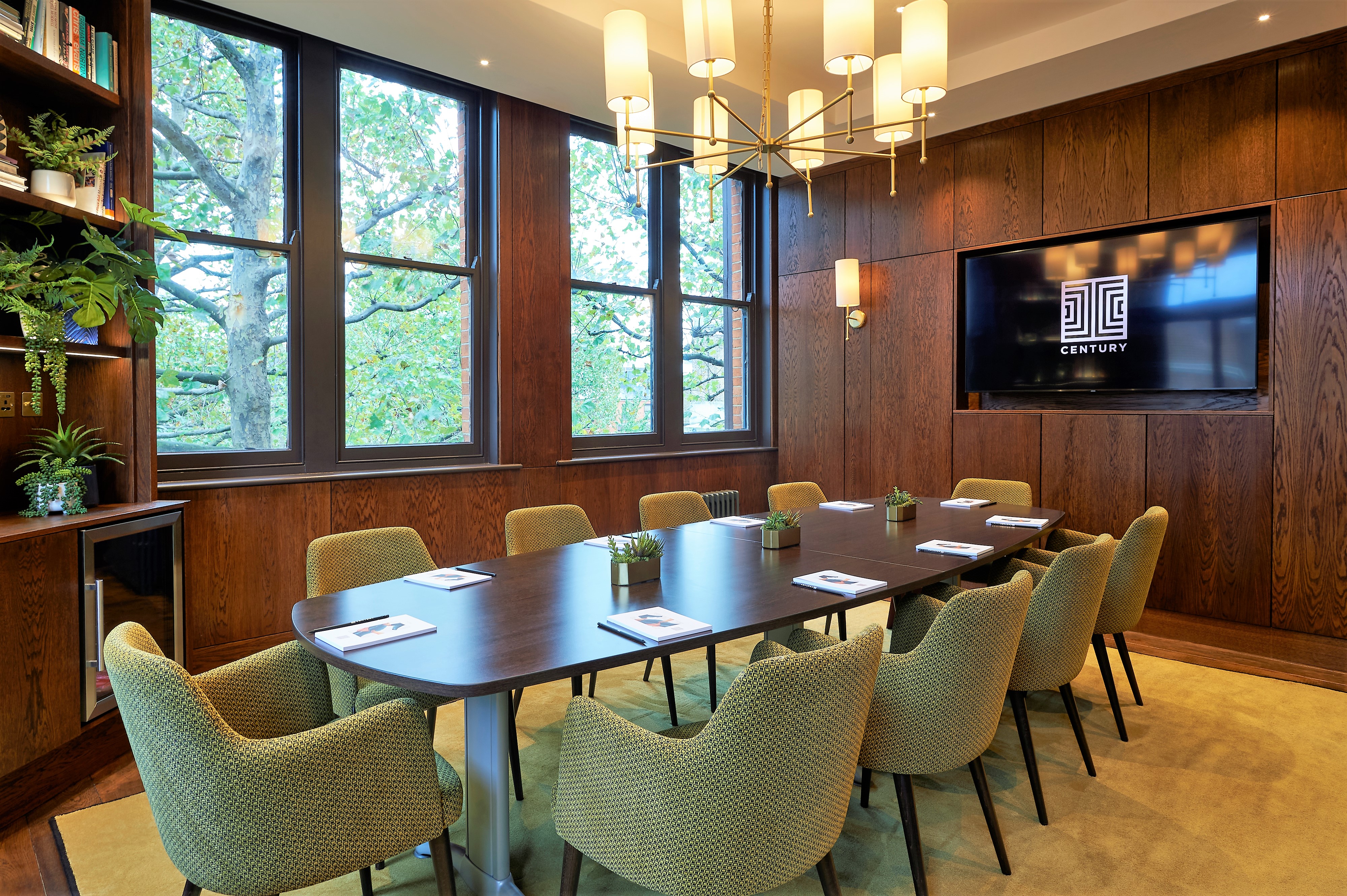 Meeting room at The Broadwick, featuring warm wood paneling for corporate events.