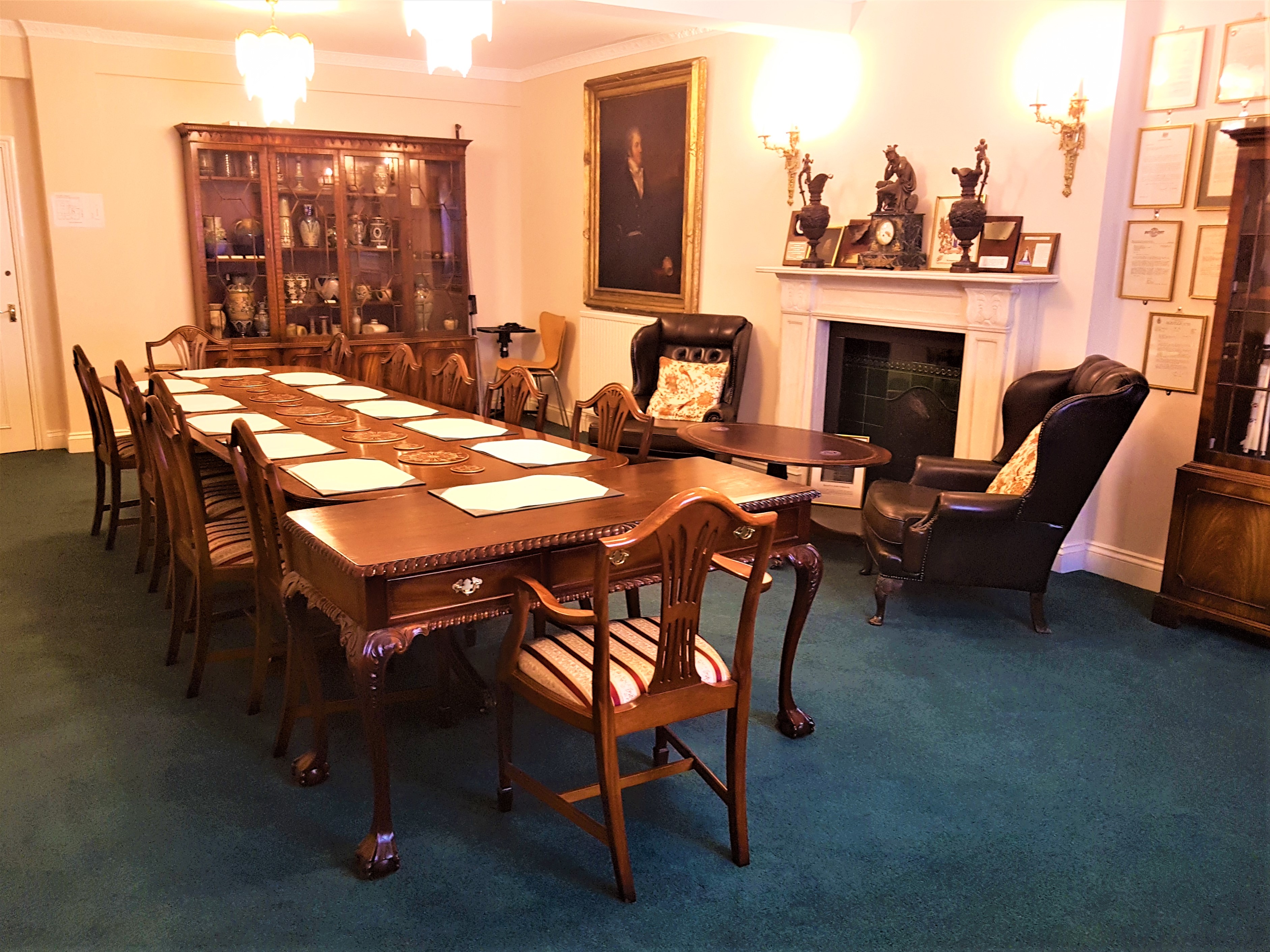 Council Room in Arthur C. Clarke House with elegant wooden table for board meetings.