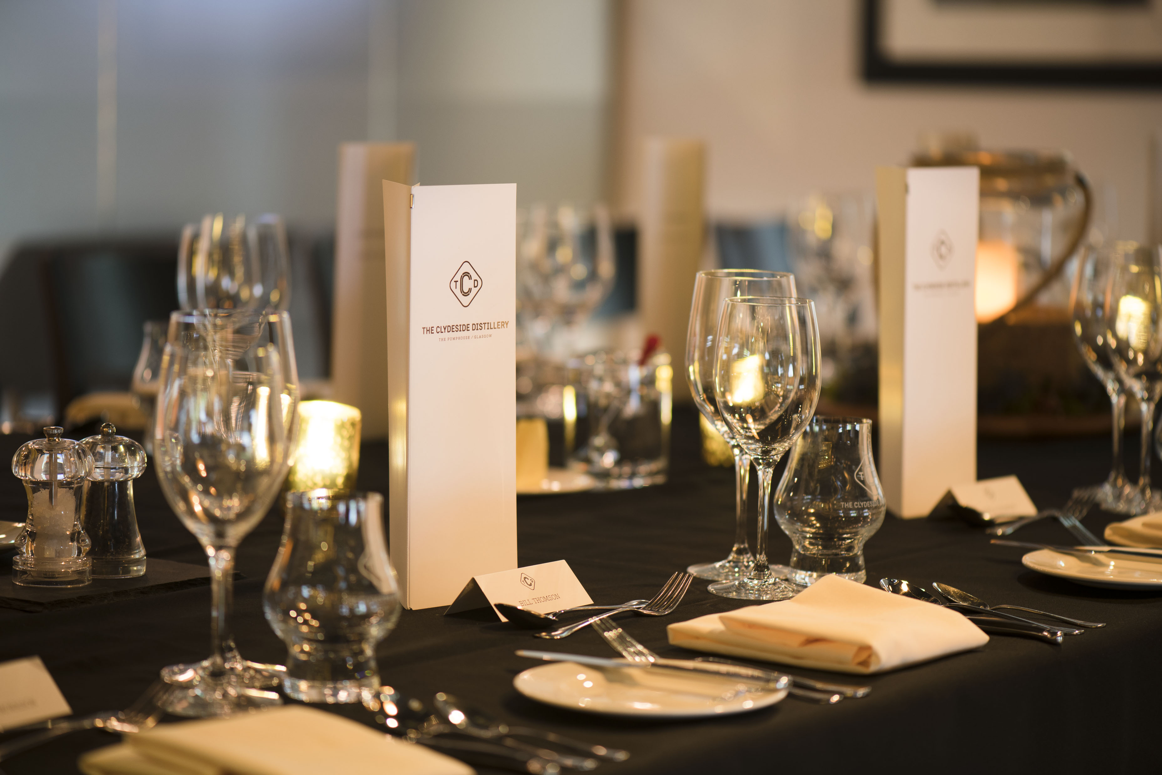 Elegant dining table setup at The Clydeside Distillery for corporate events.