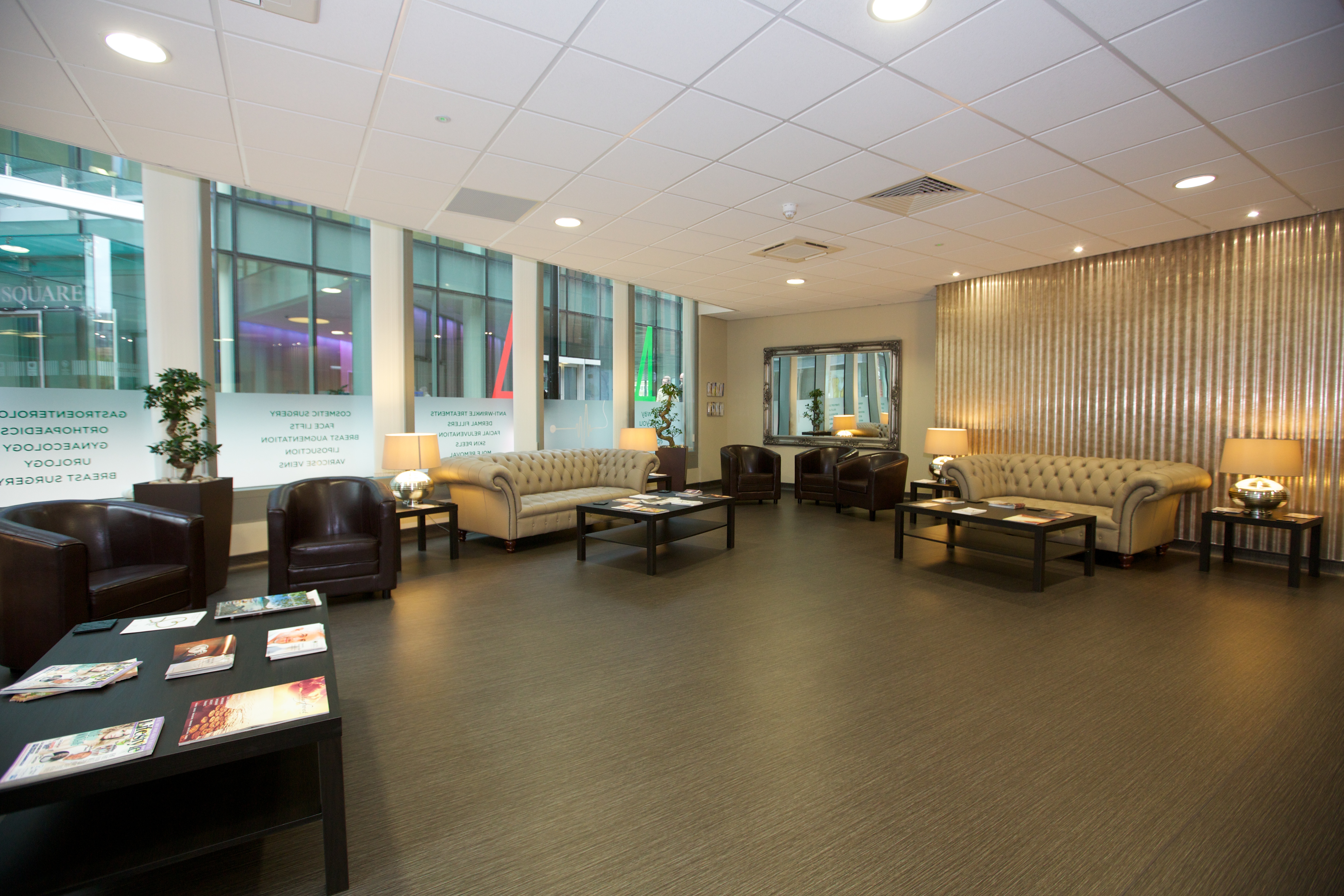 Lounge area at Pall Mall Medical for networking and meetings with modern decor.