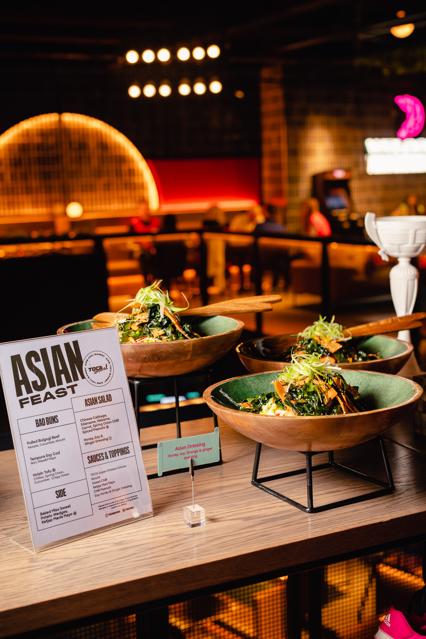 Asian-themed buffet at Players Lounge, featuring bao buns for events and gatherings.