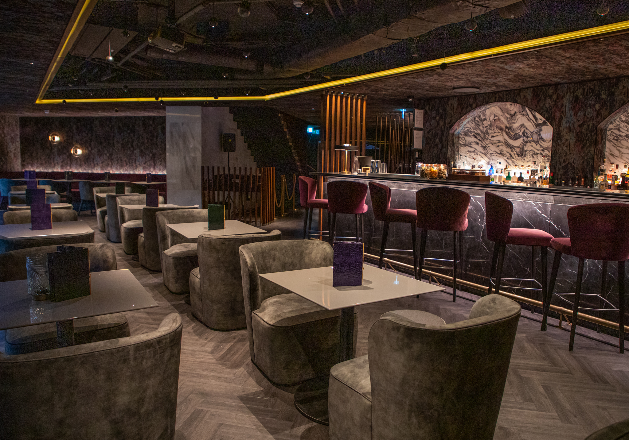 Stylish bar venue with plush seating for upscale events and cocktail receptions.