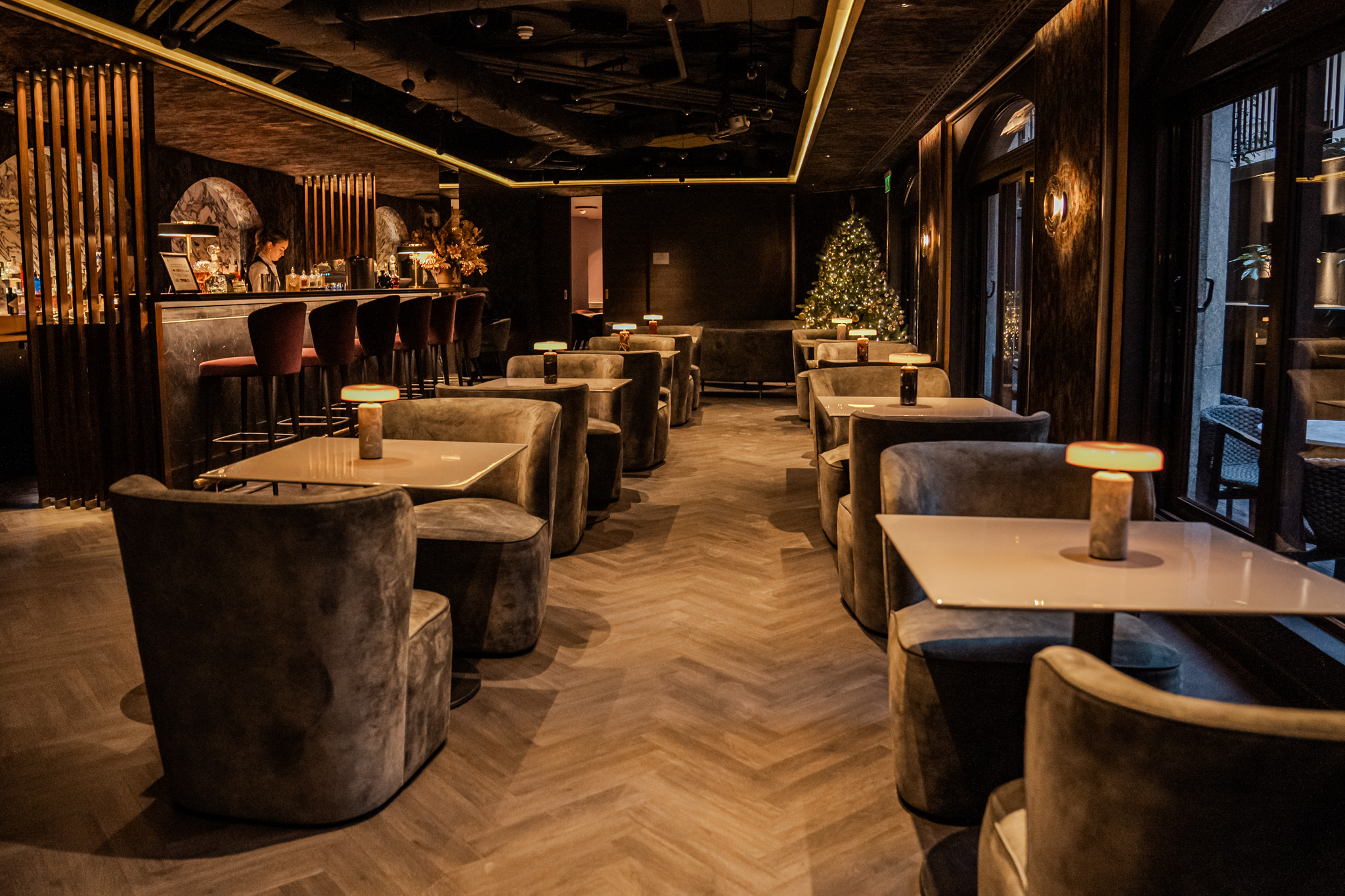 Stylish bar venue with plush seating for networking and intimate gatherings.