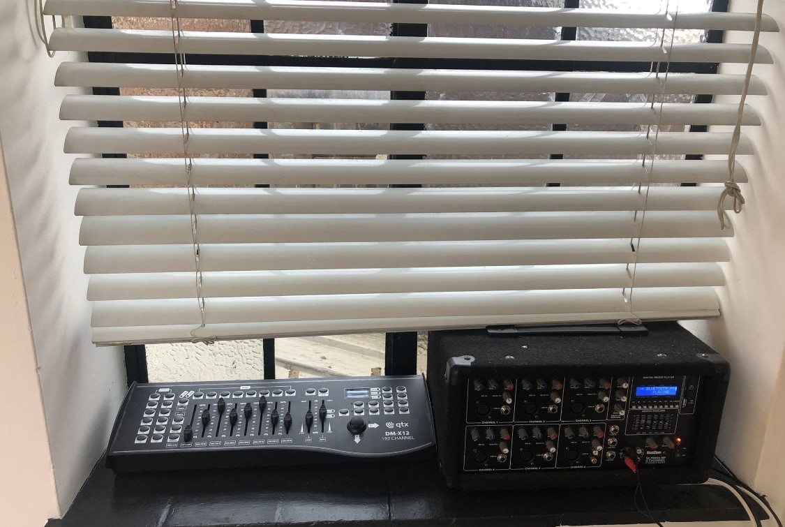 Control panel and audio equipment in Young Actors Theatre Islington for event management.