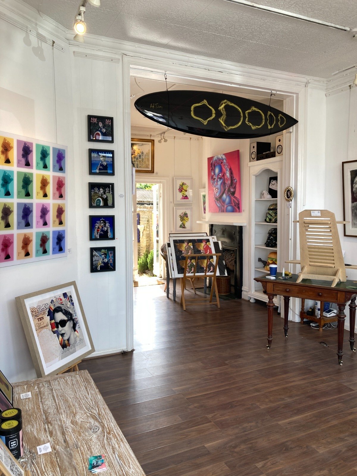 Vibrant art gallery with colorful walls, ideal for intimate events and workshops.