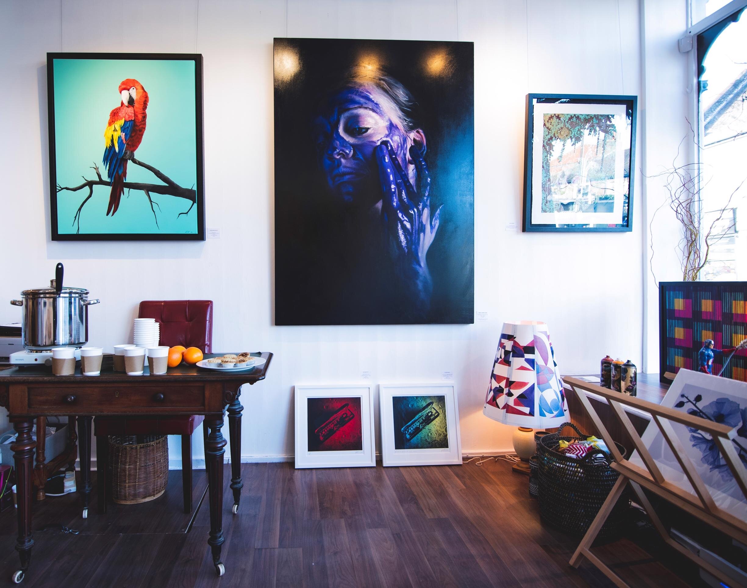 Vibrant Ad Lib Gallery space with colorful artwork for creative meetings and workshops.