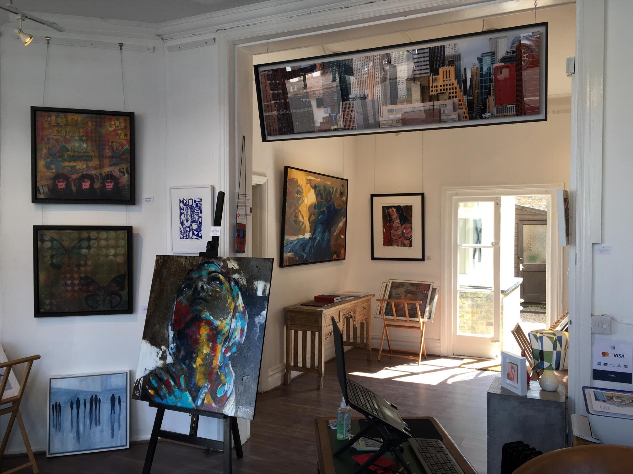 Vibrant art gallery with diverse artwork, perfect for creative events and workshops.