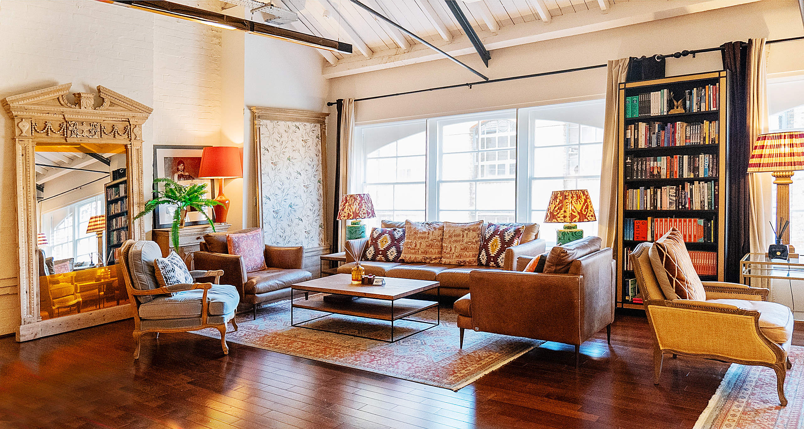 Cozy lounge at The Chalet, warm lighting for meetings and collaboration.