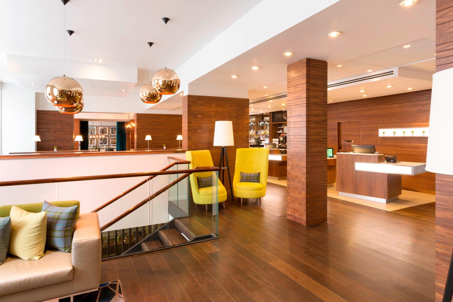 Modern lobby in Courtyard by Marriott Edinburgh, ideal for networking events and meetings.