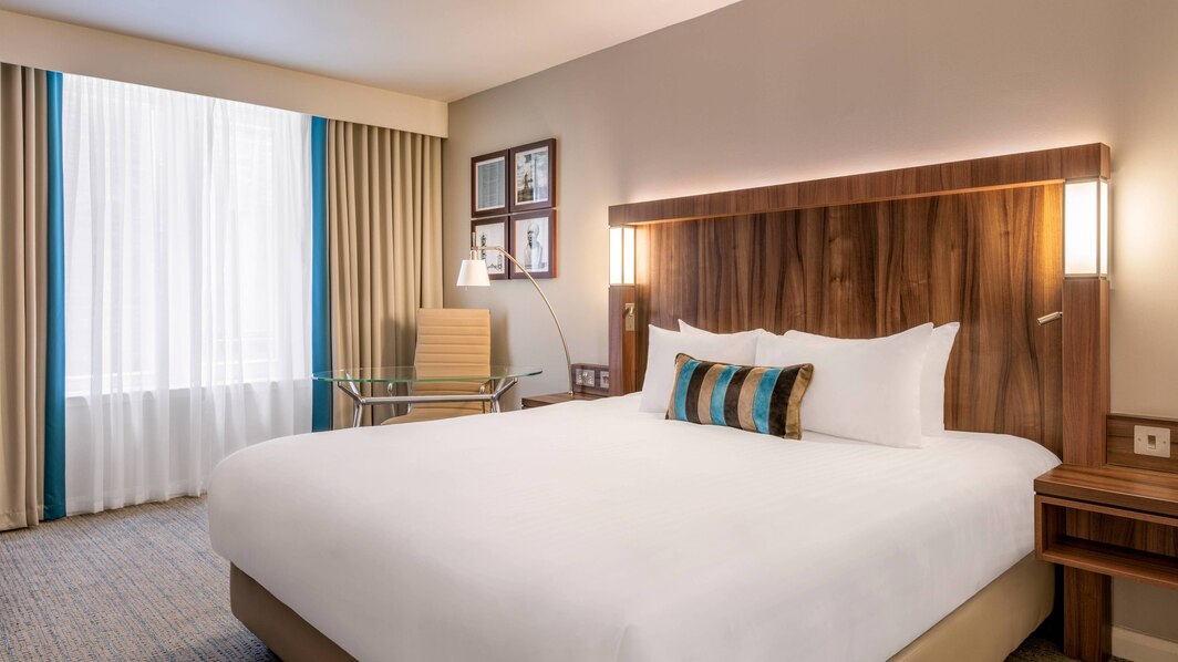 Modern hotel room in Courtyard by Marriott Edinburgh, ideal for business events and conferences.