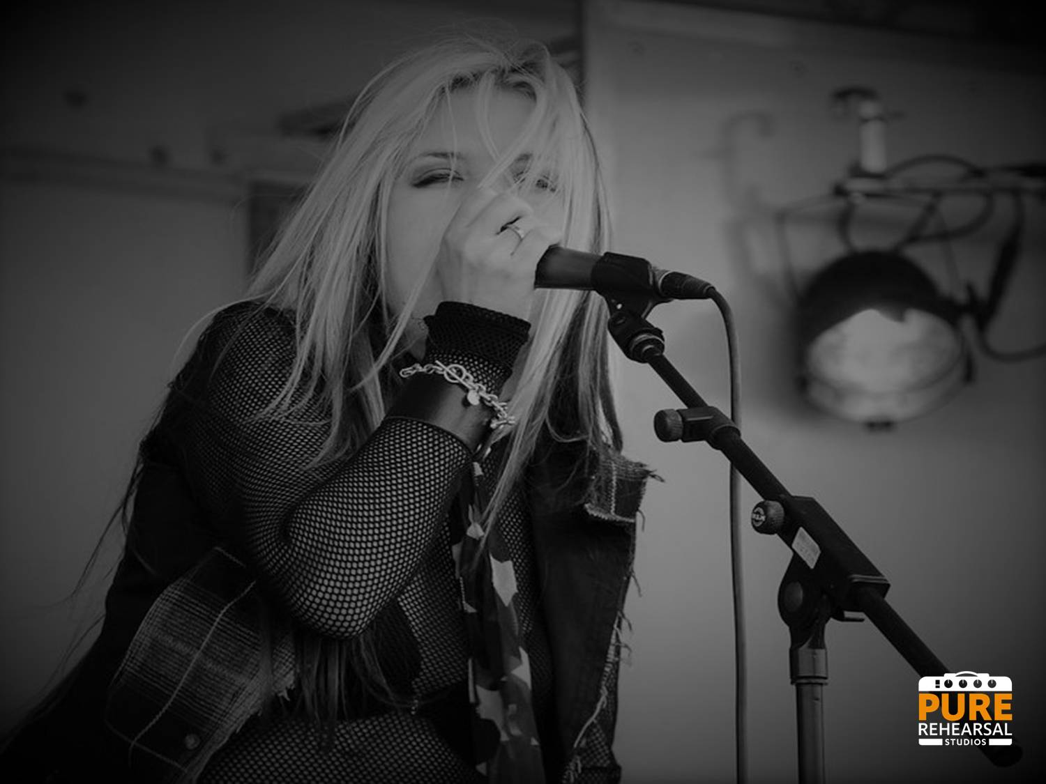 Dynamic live performance at Pure Rehearsal Studios, showcasing engaging entertainment.